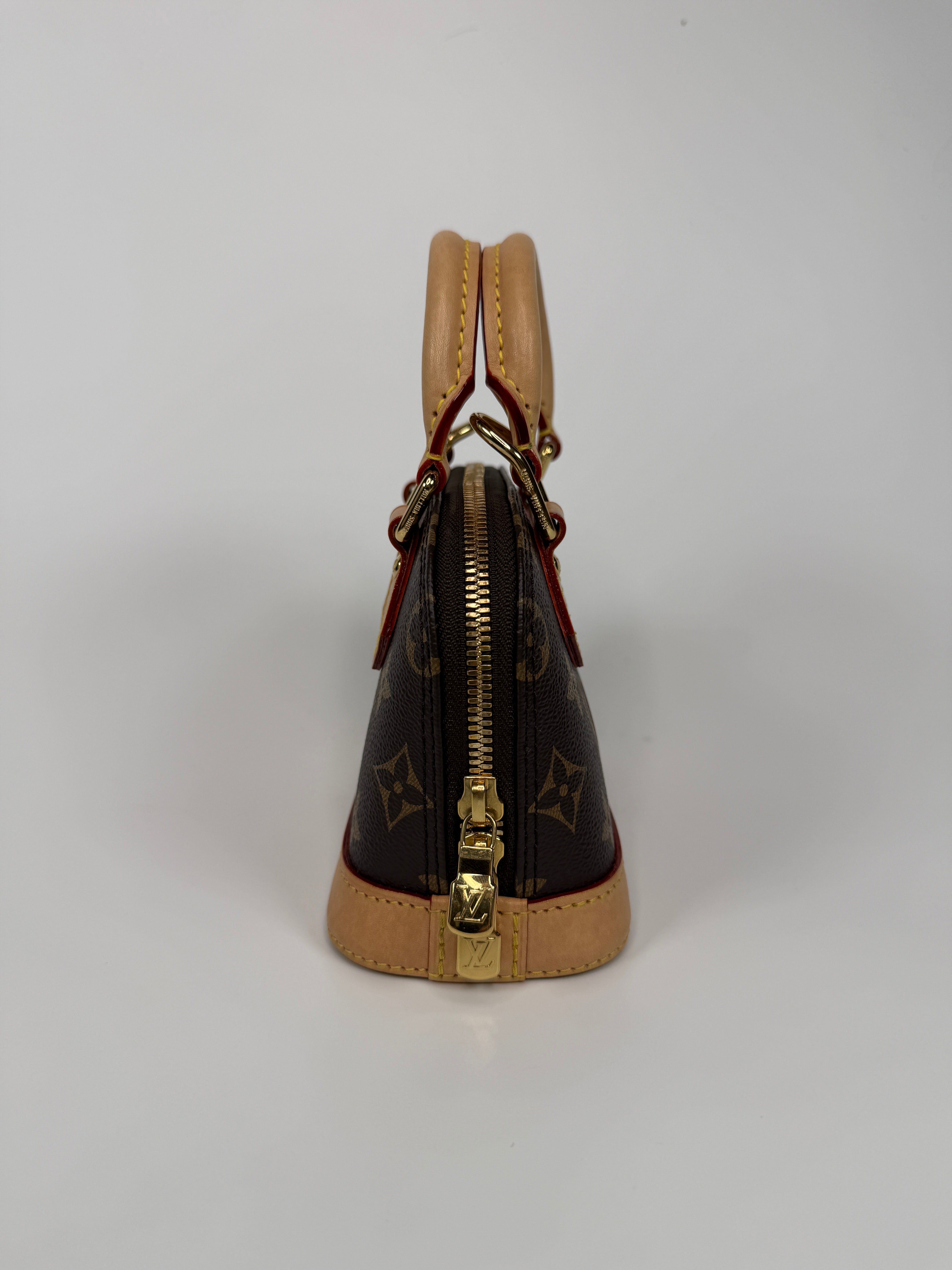 Authentic and preloved Louis Vuitton X Takashi Murakami Nano Alma Cherry Brown Monogram. Excellent condition. 100% Authenticity guarantee. Verified by Luxe Cheshire. 