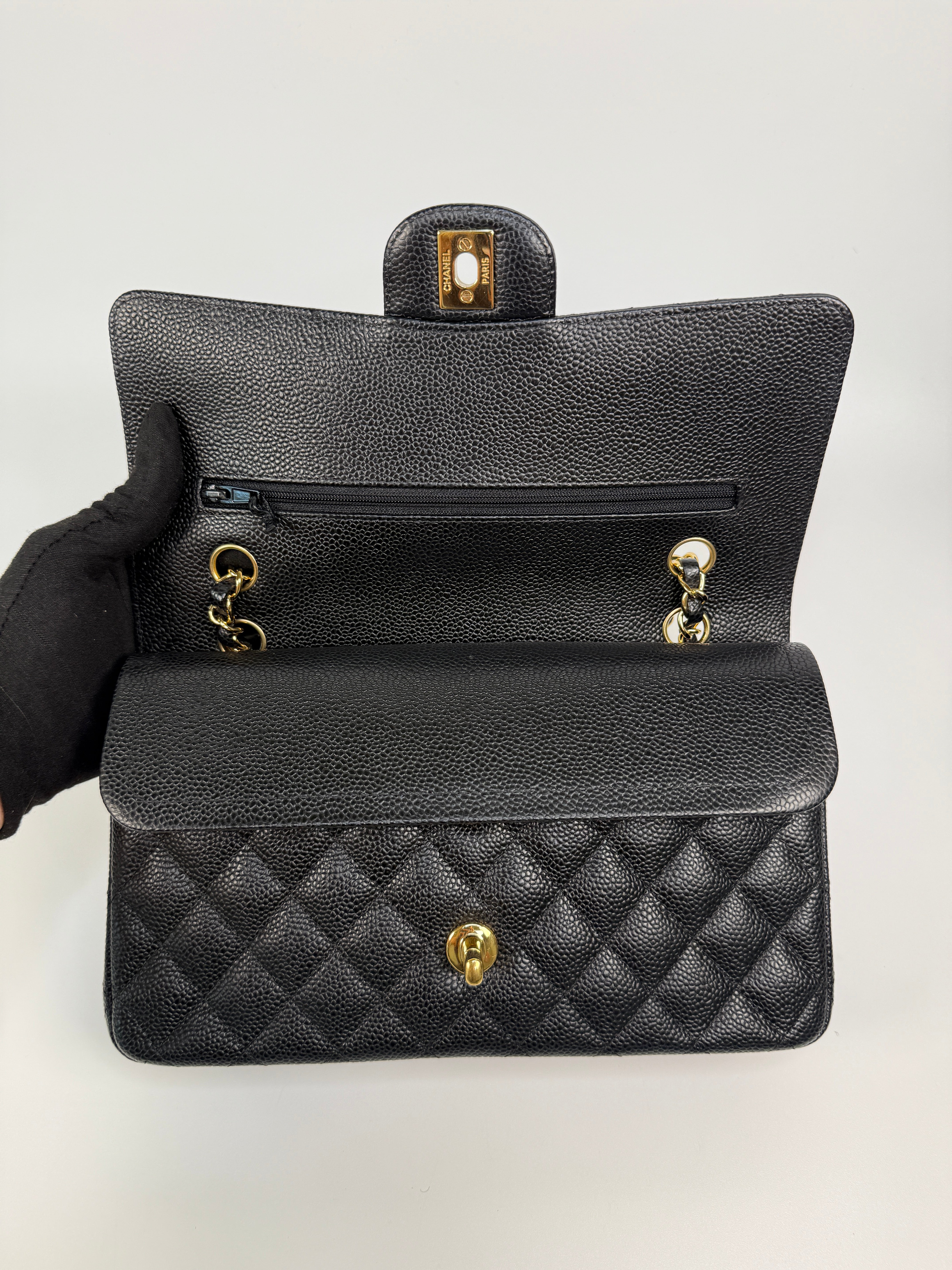 Chanel Medium Classic Double Flap In Black Caviar With Gold Hardware
Authentic Pre Loved Verified by Luxe Cheshire Trusted Designer resale