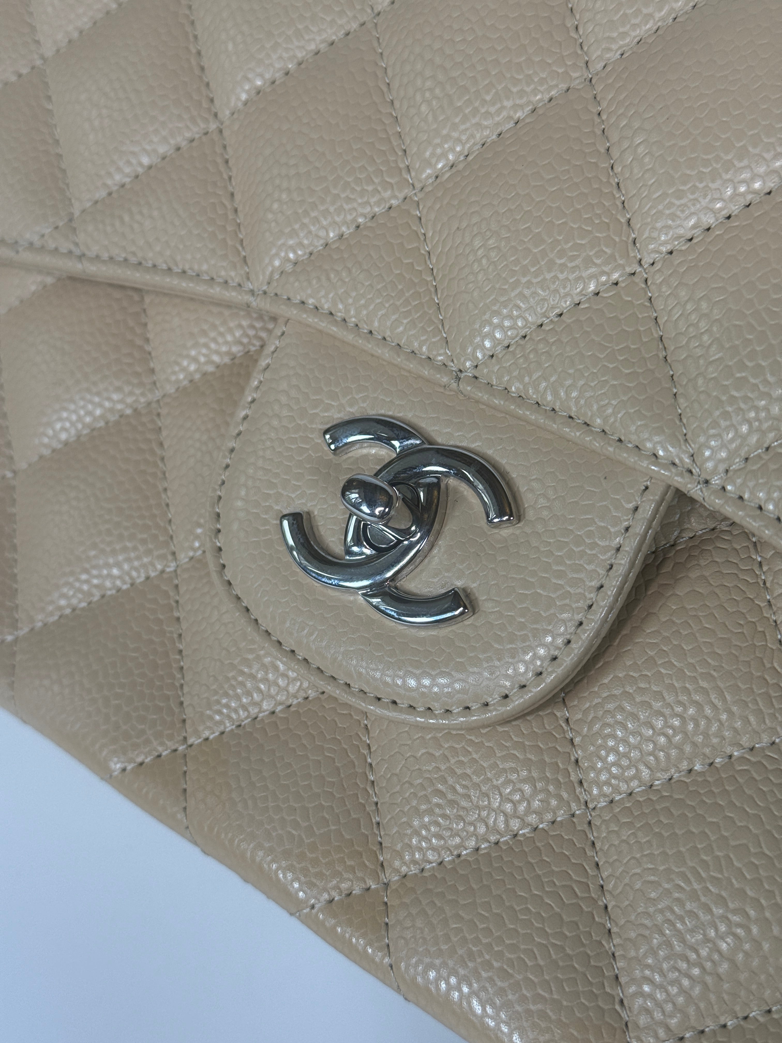 Authentic and preloved Chanel Jumbo Classic Flap Bag In Beige Caviar Leather With Silver Hardware. 100% Authenticity guarantee. Verified by Luxe Cheshire. Fully Insured next day delivery 