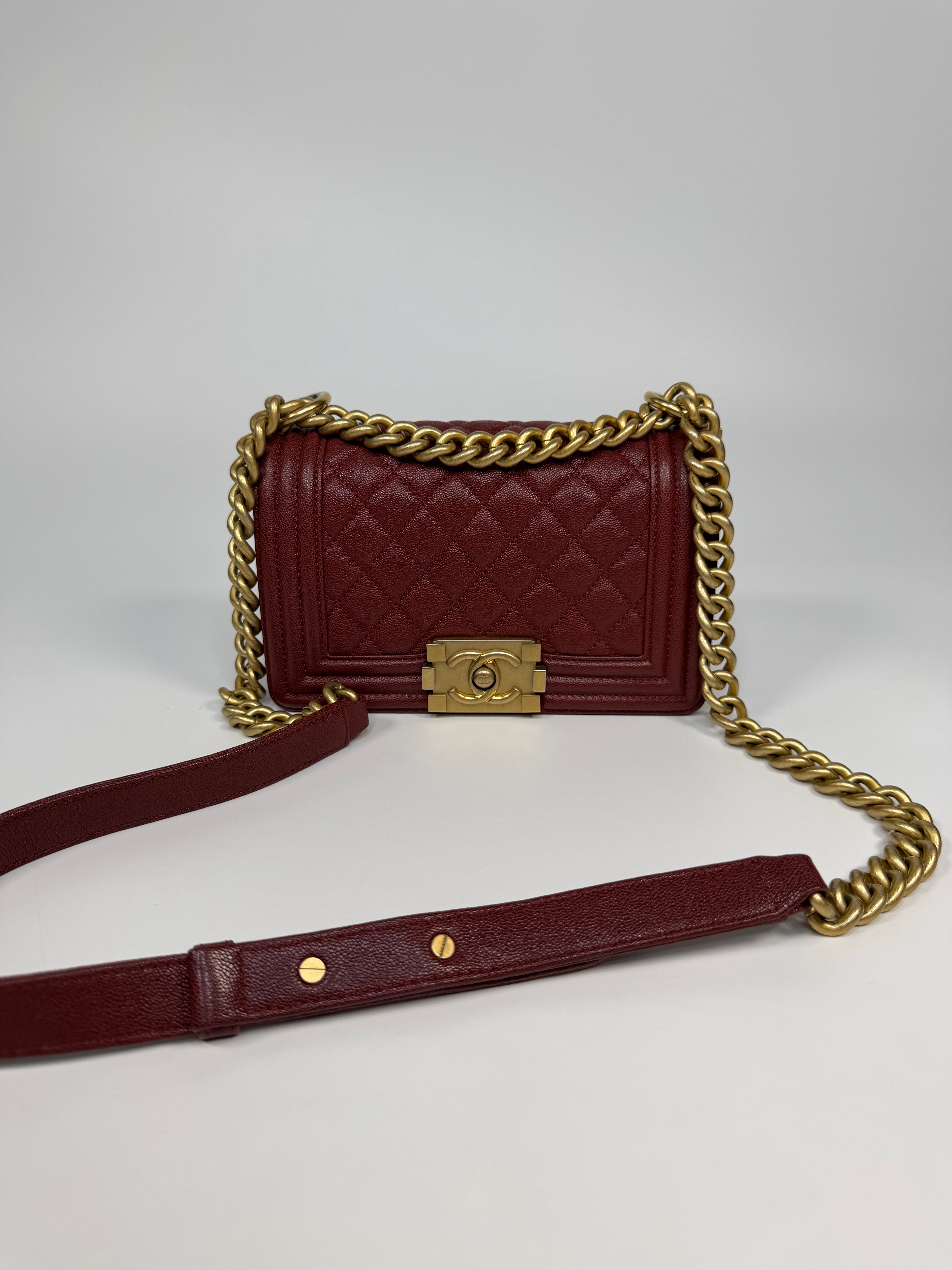 Chanel Le Boy Bag In Burgundy Caviar Leather Gold Hardware. Authentic and preloved in excellent condition.