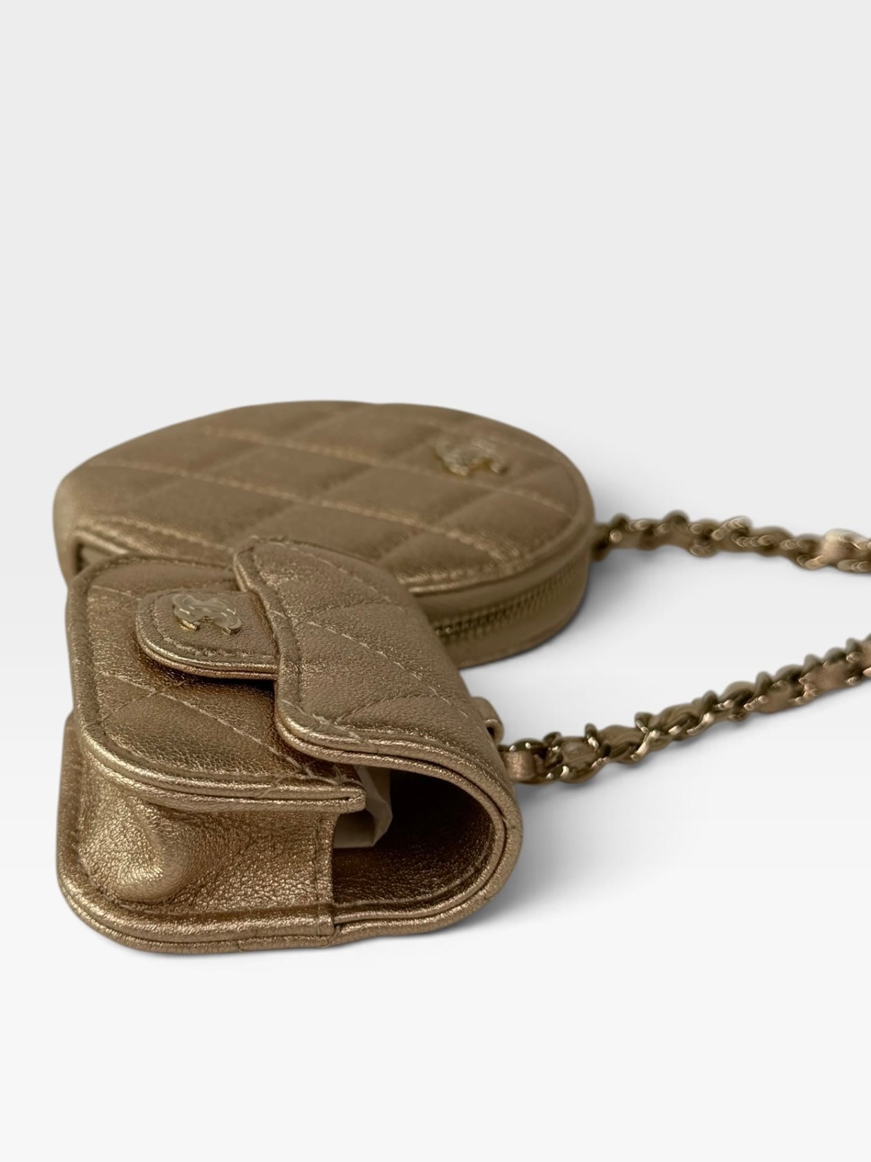 Chanel Round Purse and AirPods Case In Metallic Gold Lambskin. 100% authentic and preloved in excellent condition.