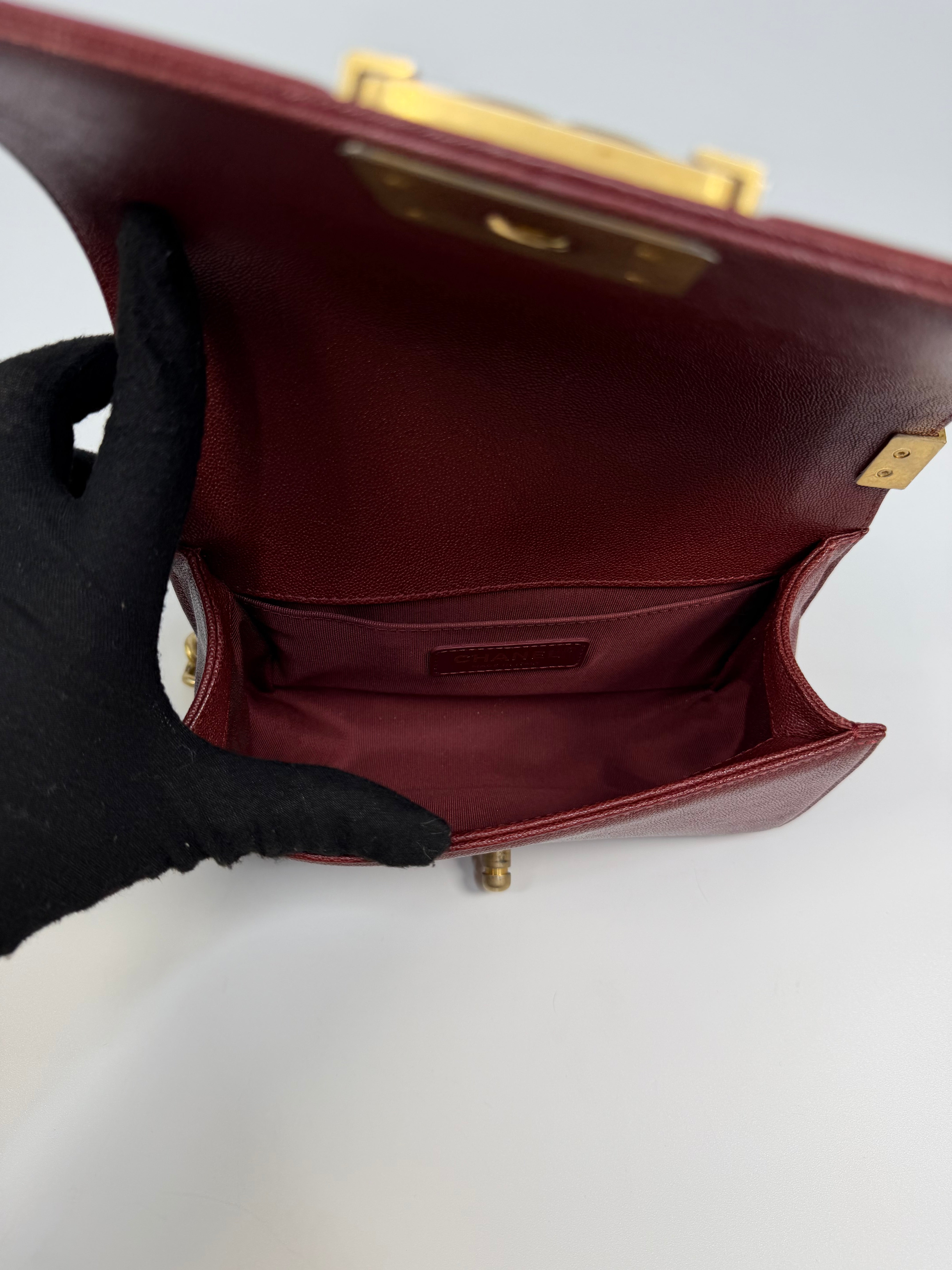 Chanel Le Boy Bag In Burgundy Caviar Leather Gold Hardware. Authentic and preloved in excellent condition.