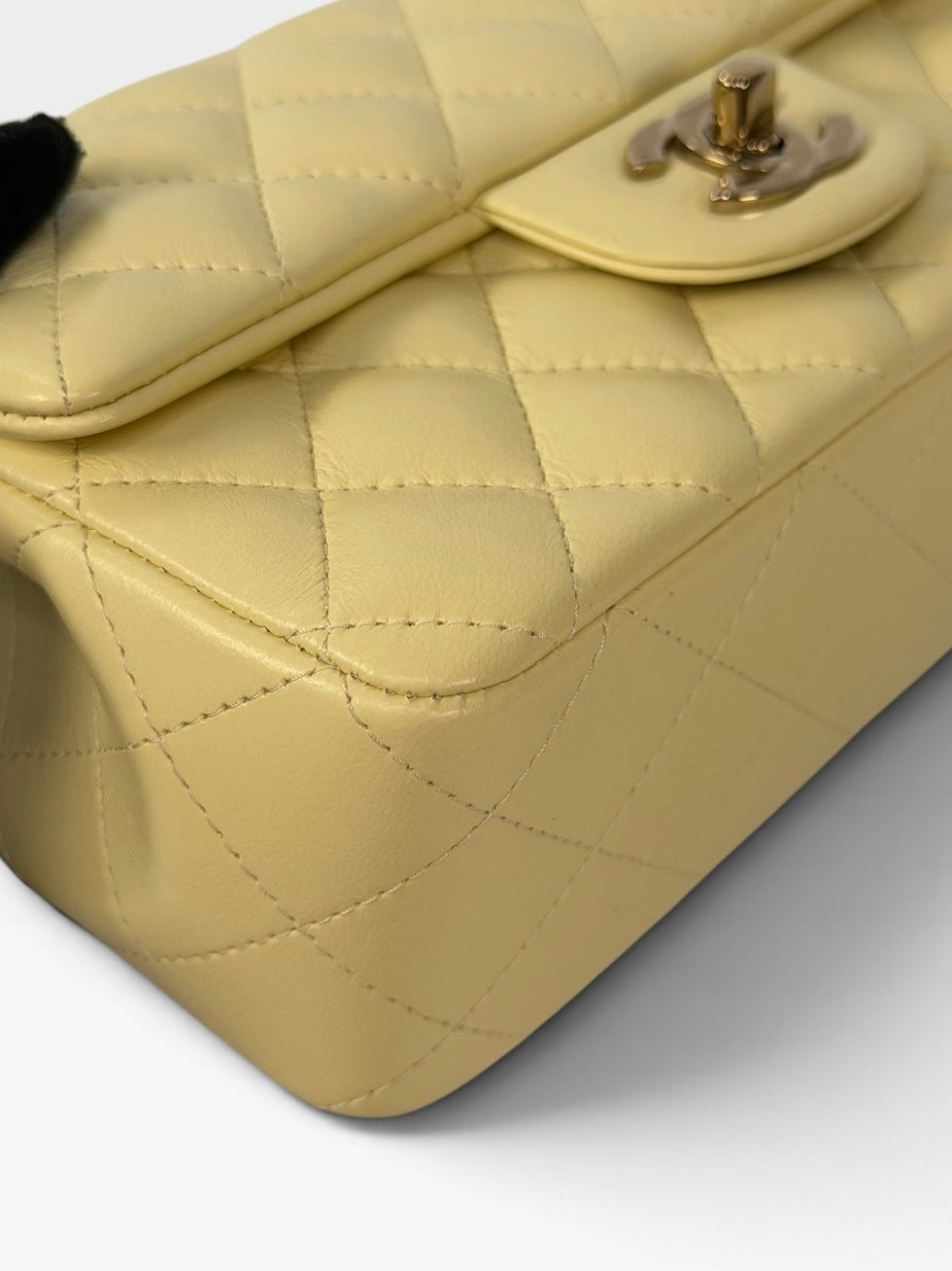 Chanel Mini Rectangle In Yellow Lambskin Leather With Gold Hardware. 100% authentic and preloved in excellent condition
