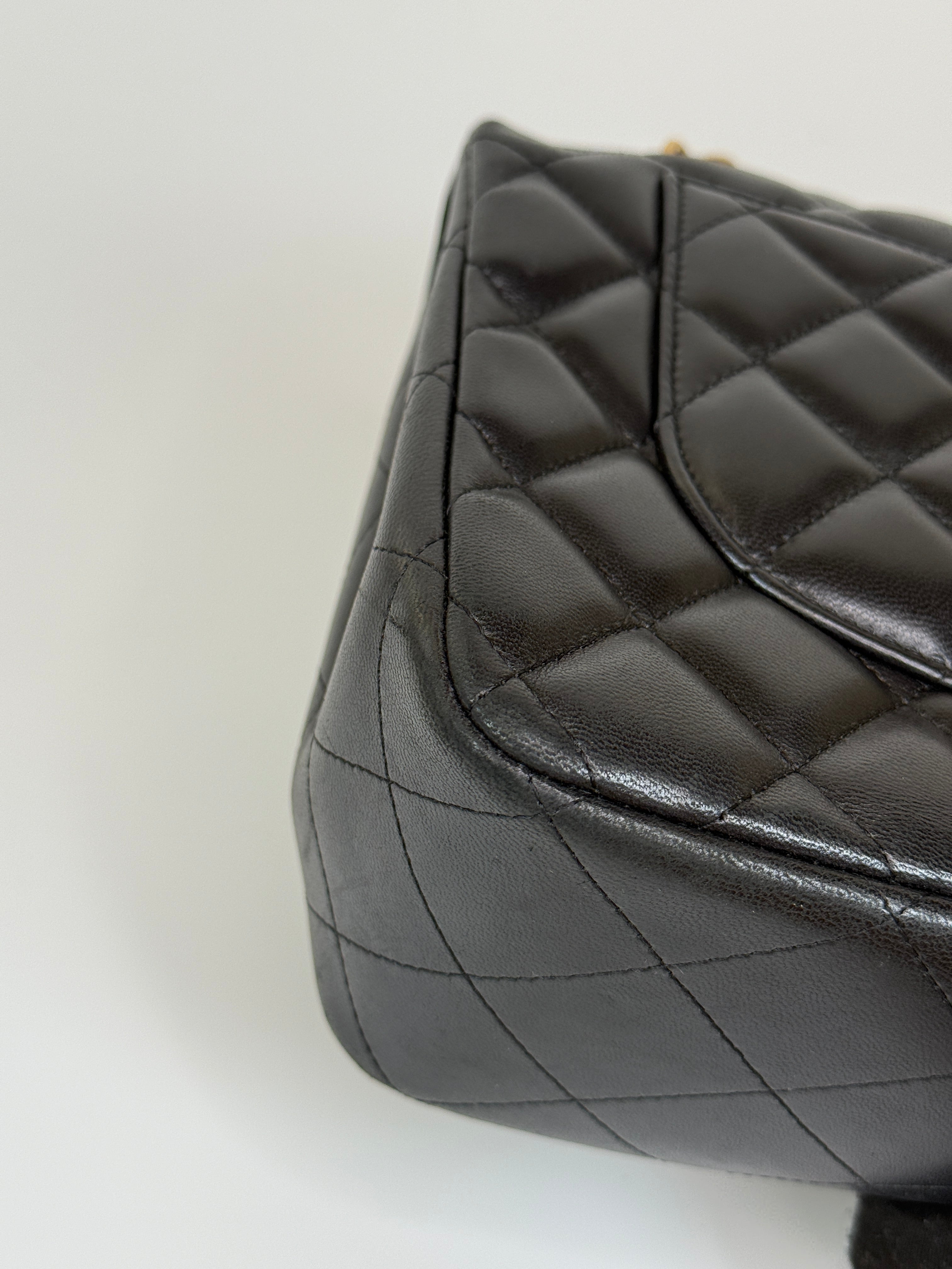 Authentic and preloved Chanel Jumbo Classic Flap Bag In Black Lambskin Leather With GOLD Hardware. Excellent condition. 100% Authenticity Guarantee 