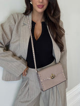 Valentino Garavani Medium Rockstud Flip Lock Crossbody Bag