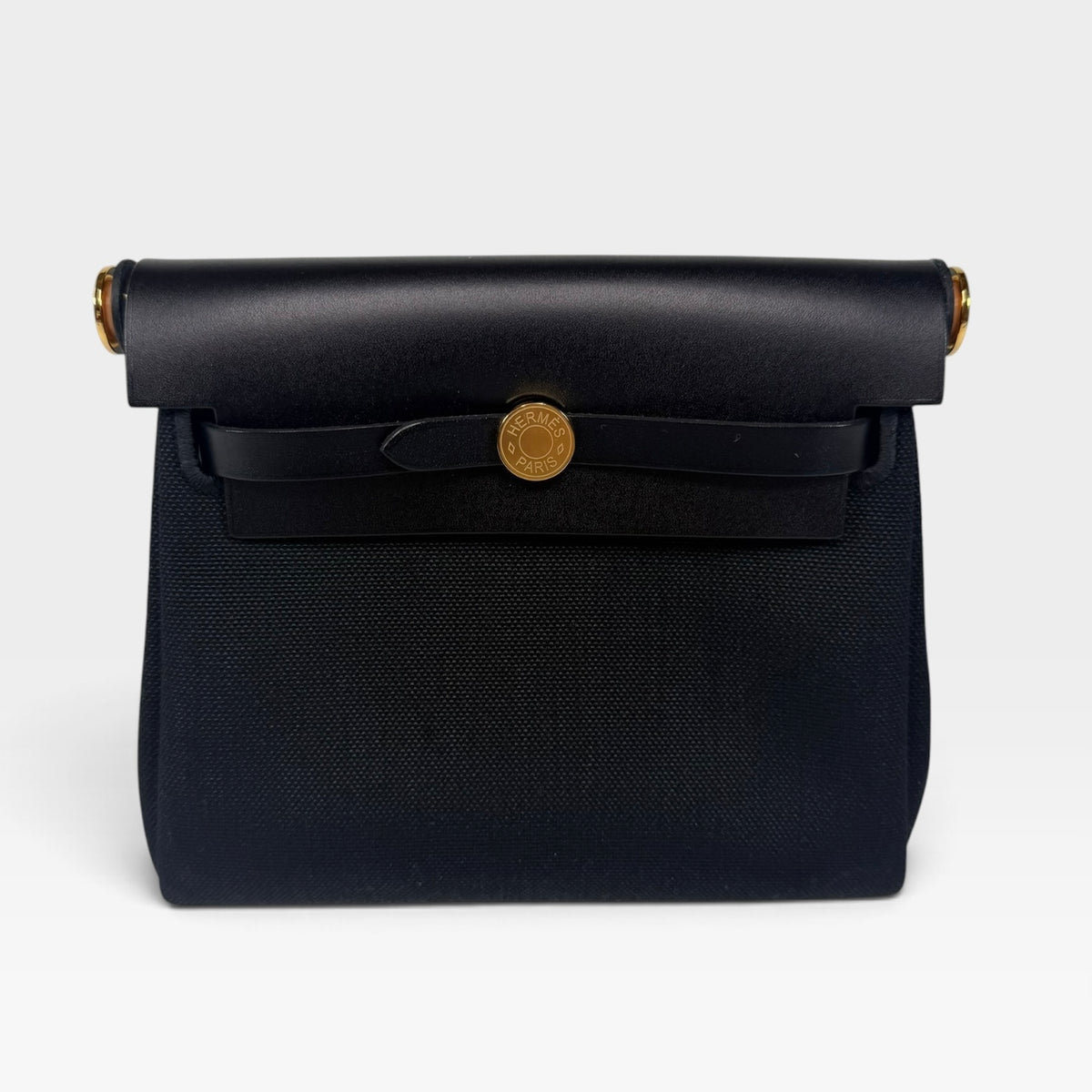 Hermès Herbag Zip 20 In Noir / Noir Canvas With Gold Hardware. Authentic and preloved in new and unused condition. 100% Guarantee