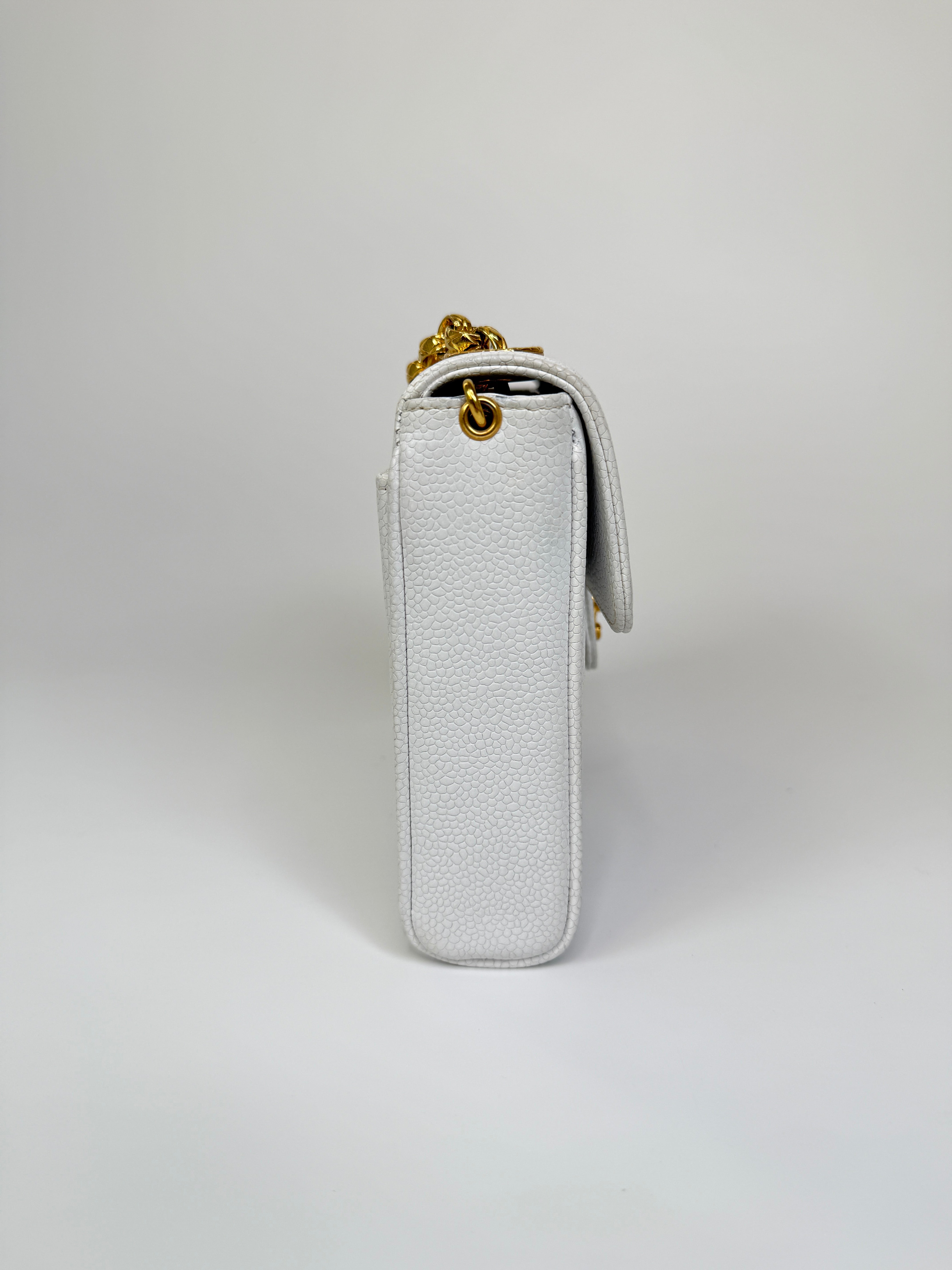 Chanel Vintage Mini Square Flap In White Caviar Leather With 24kt Gold Hardware. Excellent condition 100% Authenticity Guarantee 