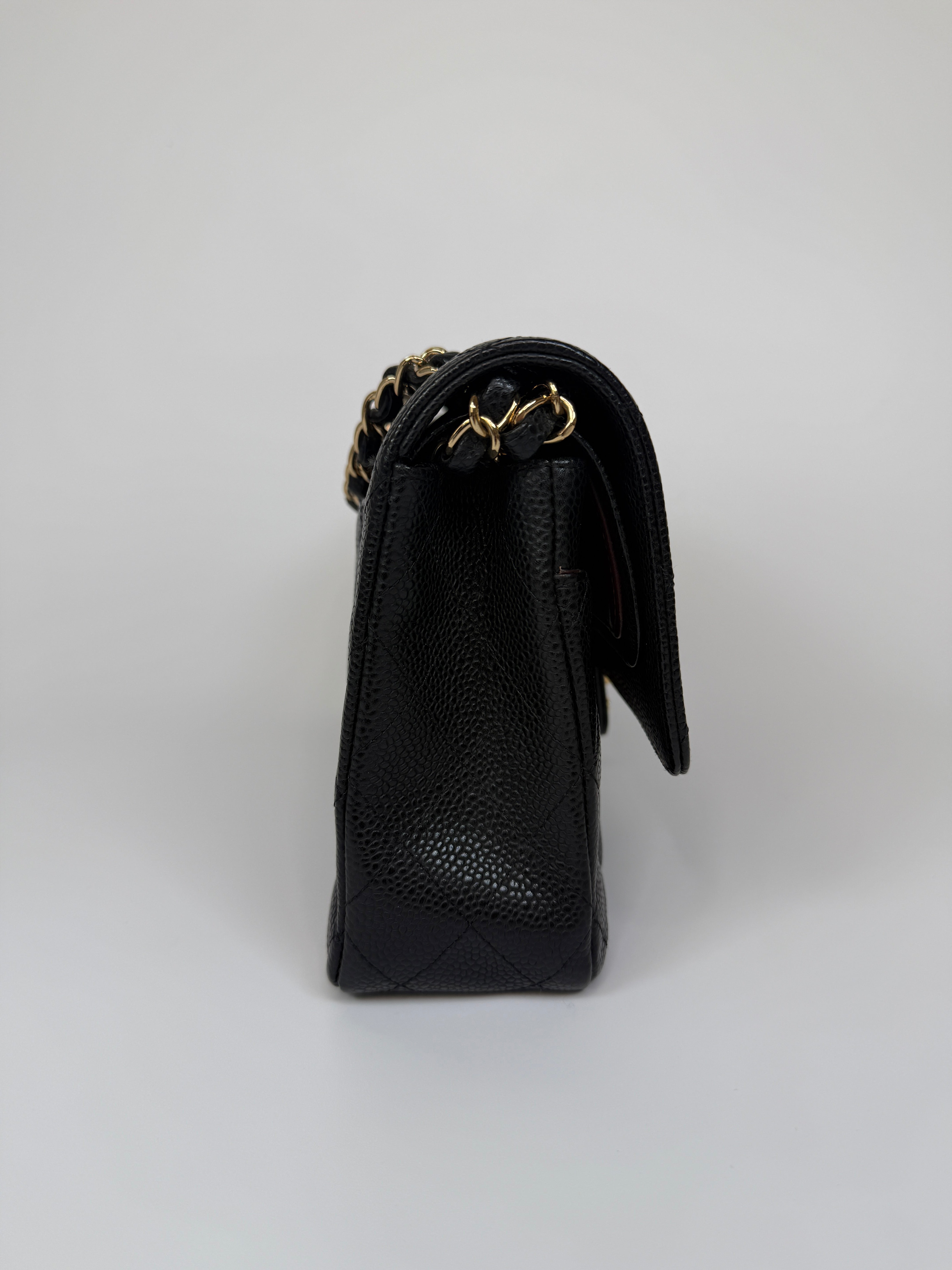 Chanel Medium Classic Double Flap Black Caviar Leather With Gold Hardware. Authentic and preloved. 100% Authenticity guarantee 