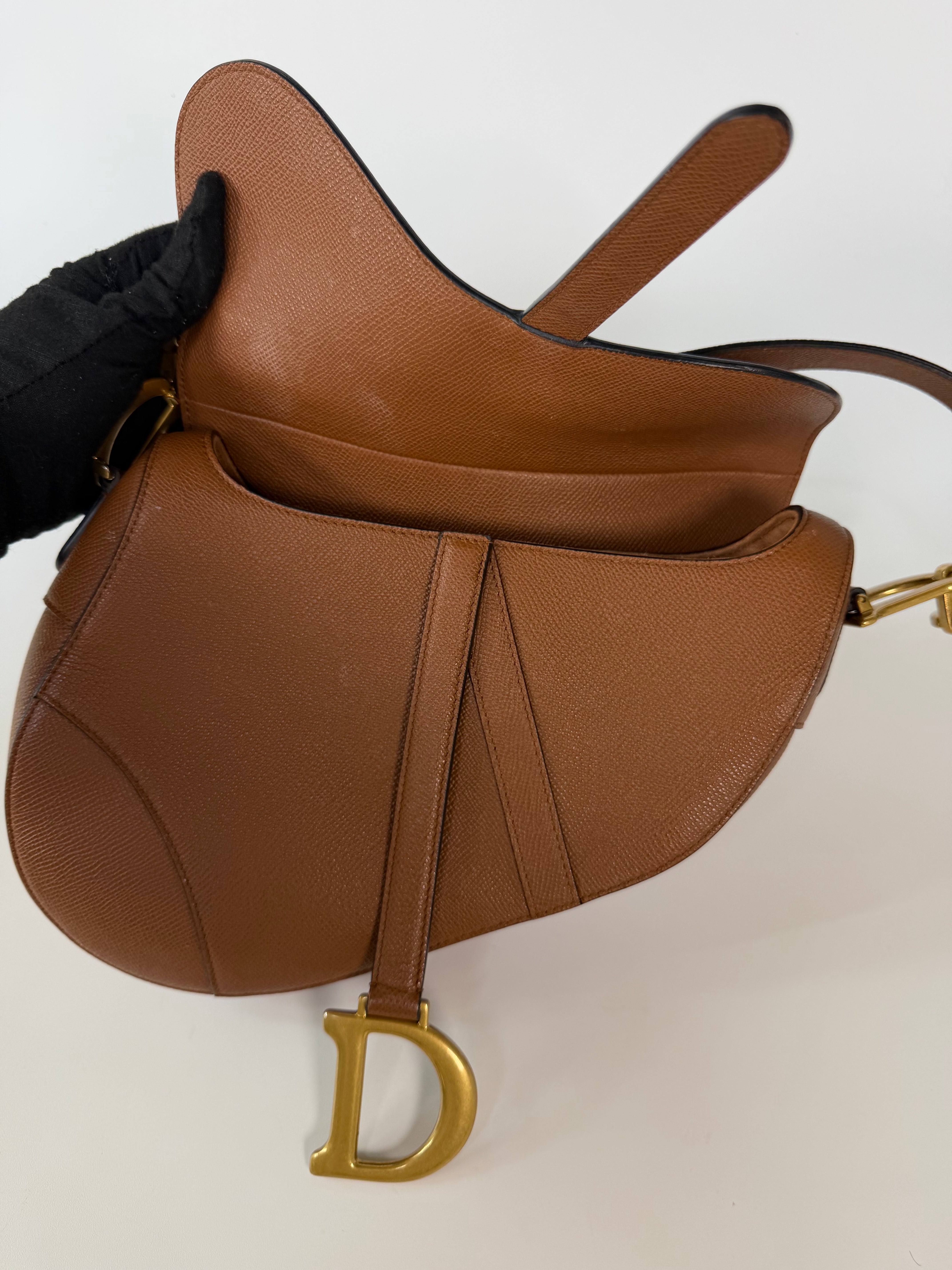 Christian Dior Saddle Bag In Golden Calfskin Gold Hardware. 100% authentic and preloved in excellent condition.