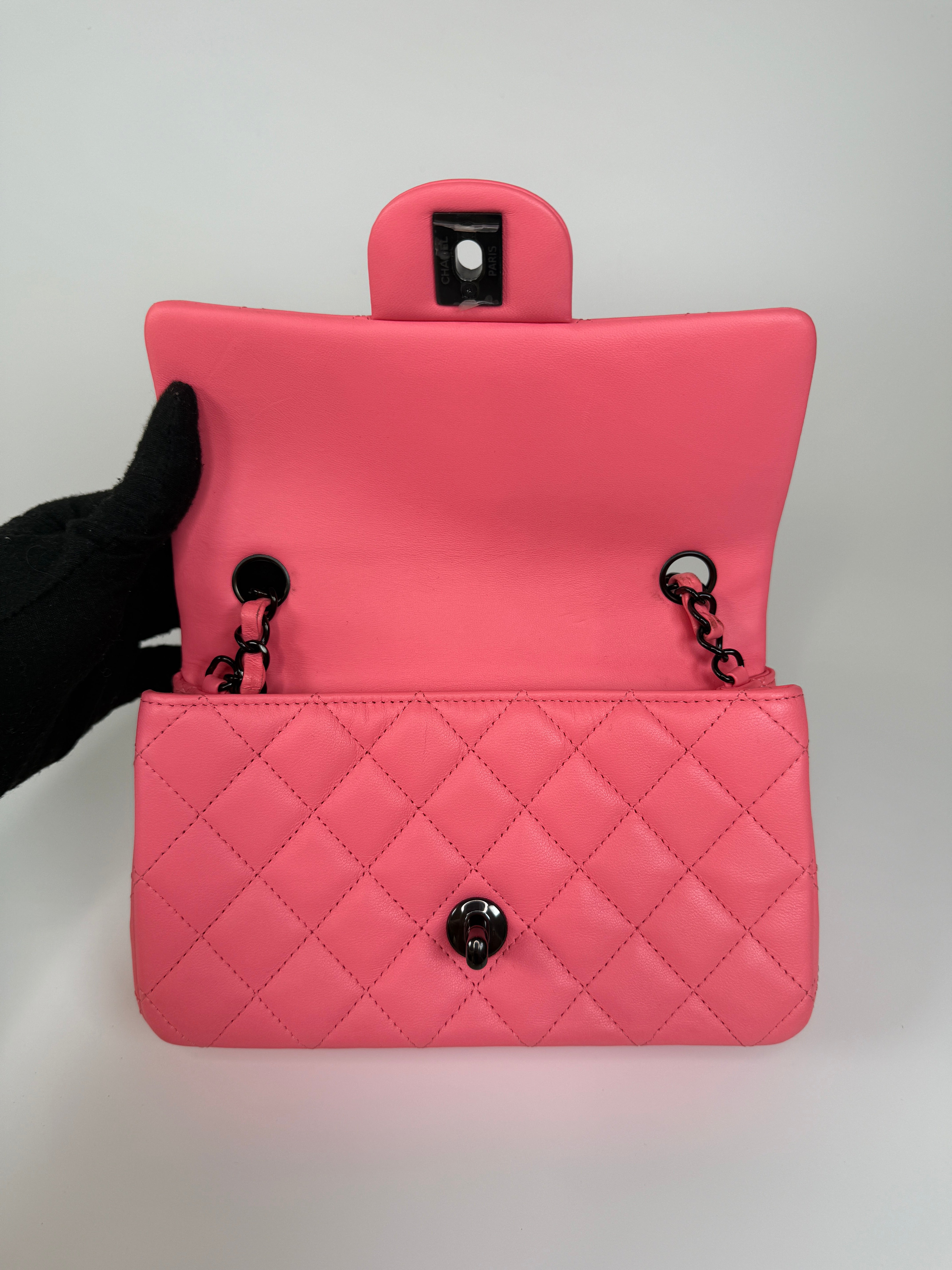 Chanel Mini Rectangle Flap Bag In Pink Lambskin With Black Hardware In Excellent Condition. Authentic and preloved. 
