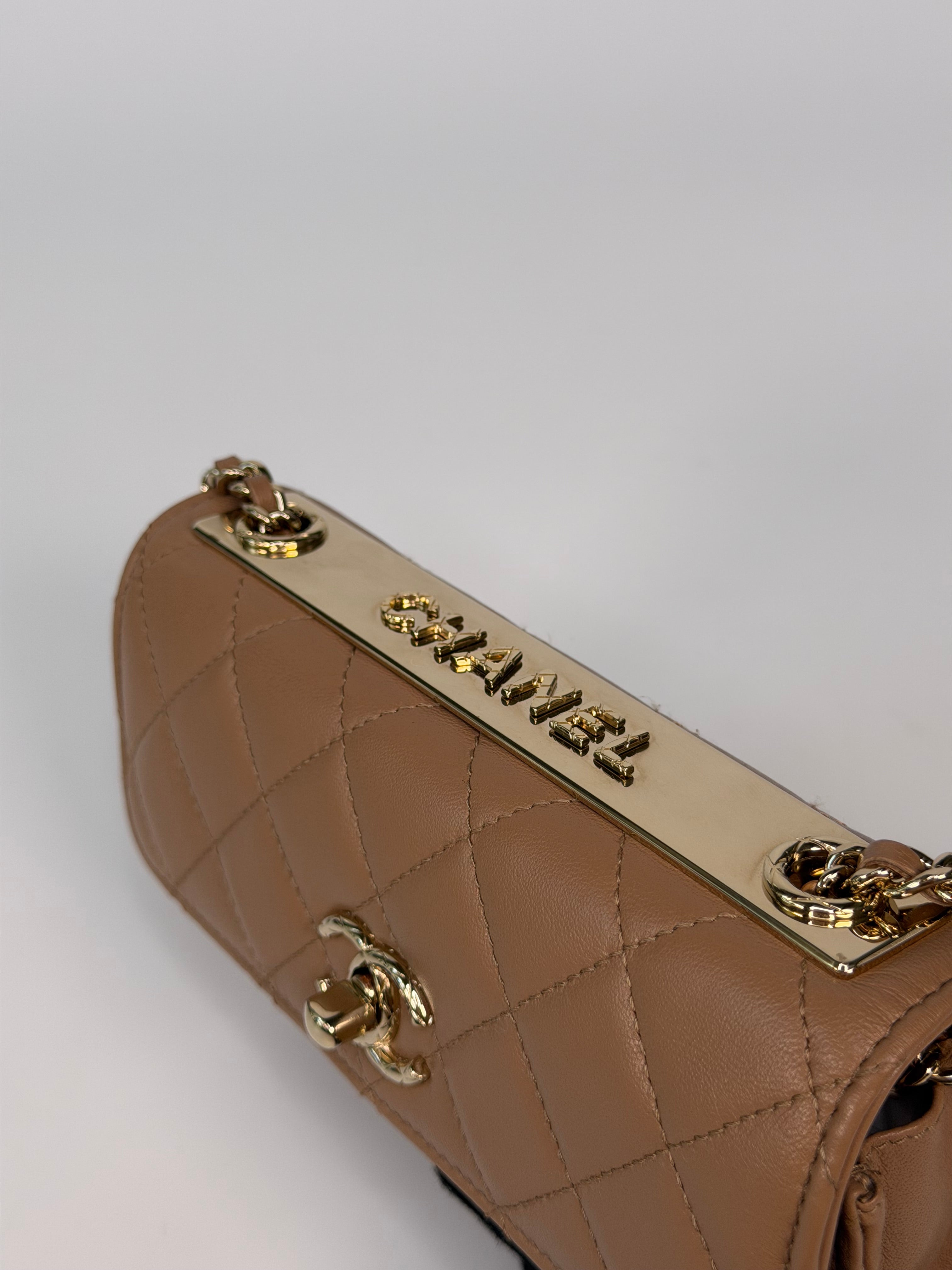 Chanel Trendy Wallet On Chain In Beige Lambskin With Gold Hardware. Authentic and preloved in excellent condition. 100% guarantee