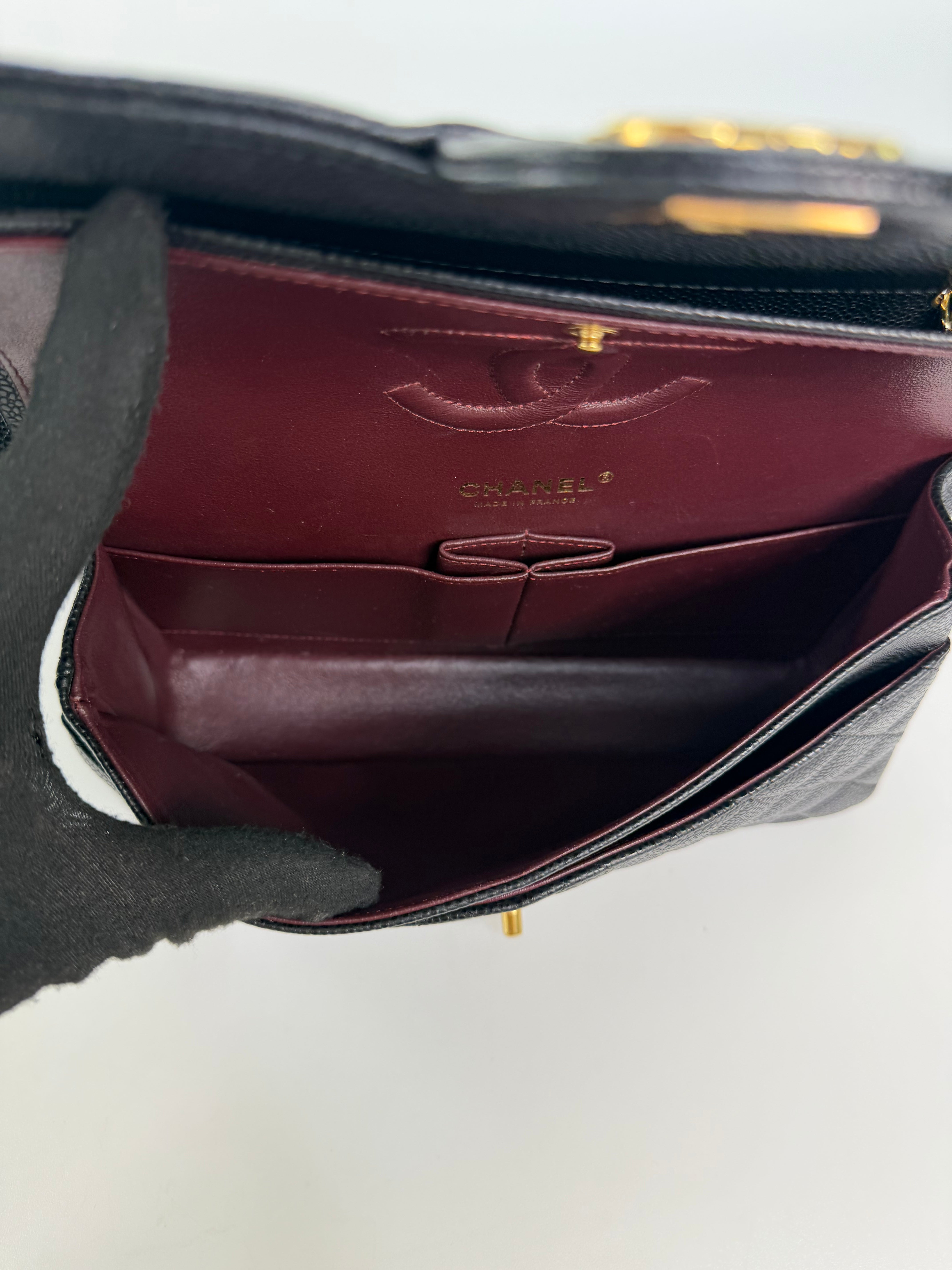 Chanel Medium Classic Double Flap Black Caviar Gold Hardware. Authentic and preloved in excellent condition.  100% guarantee