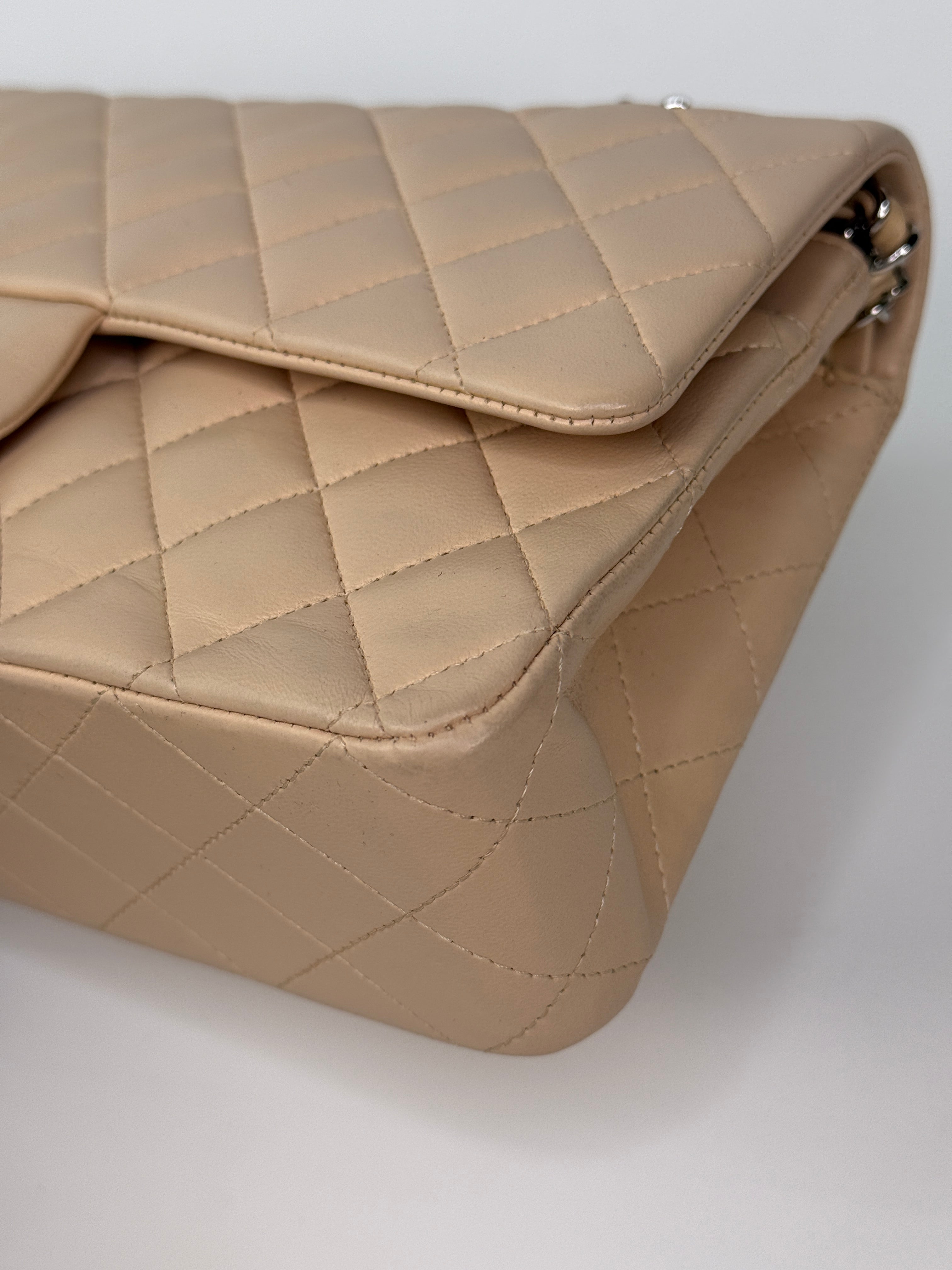 Authentic and preloved Chanel Medium Classic Double Flap Light Beige Lambskin Leather With Silver Hardware