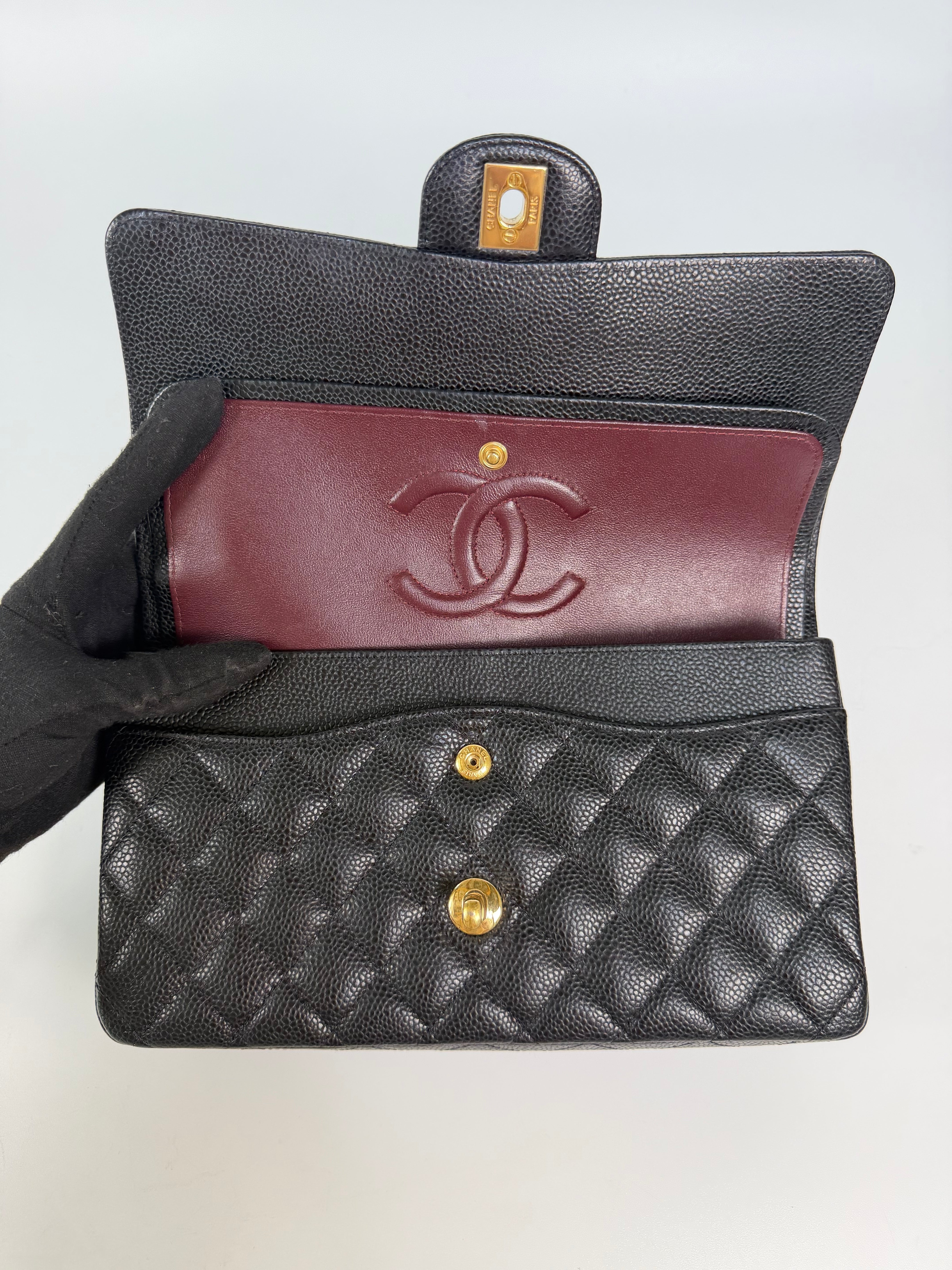 Chanel Medium Classic Double Flap Black Caviar Gold Hardware. Authentic and preloved in excellent condition.  100% guarantee