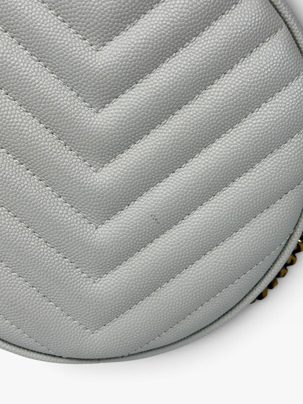 Saint Laurent Vinyle Round Bag In Stone Matelasse Chevron With Gold Hardware. 100% authentic and preloved in excellent condition