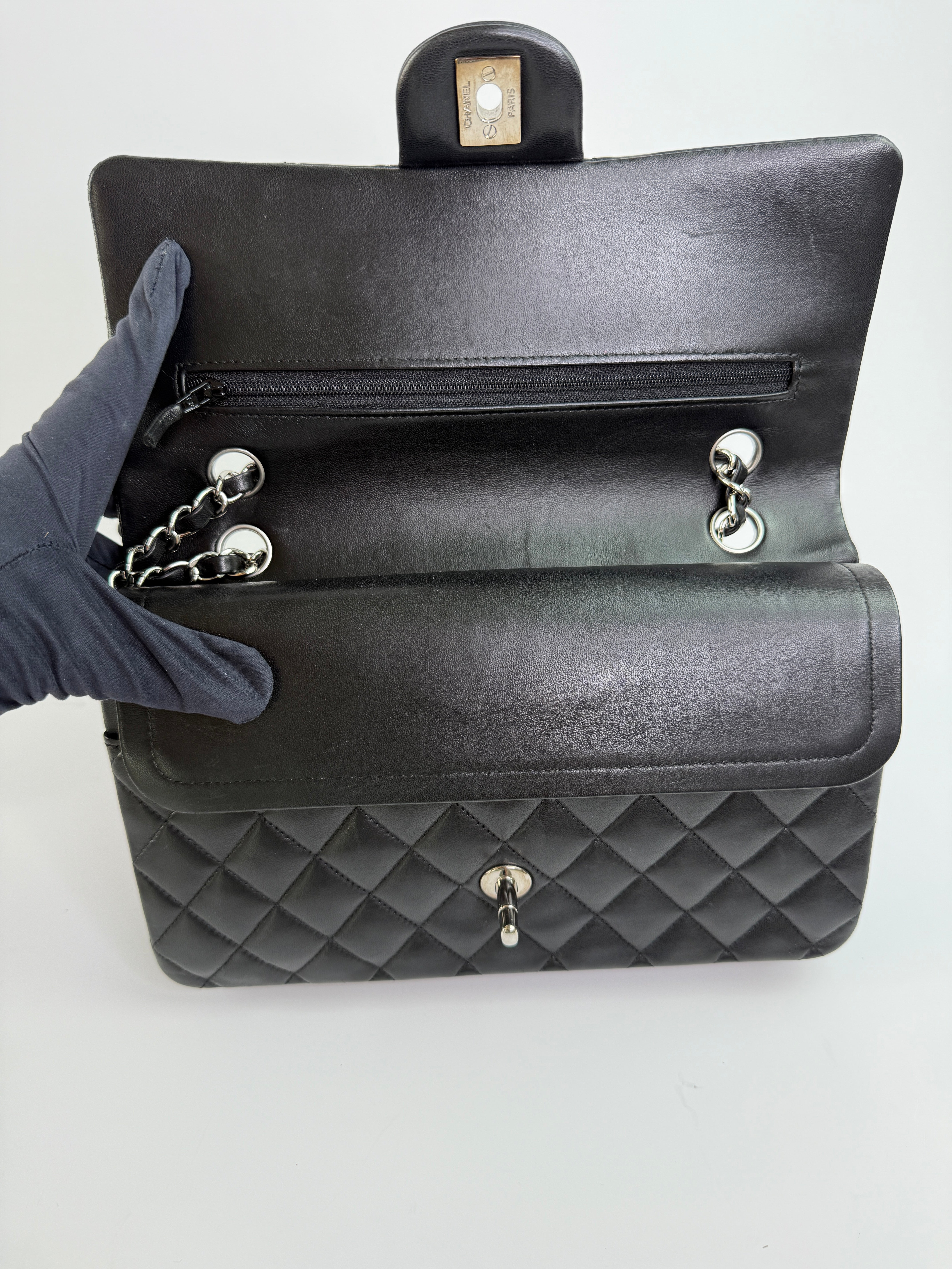 Chanel Medium Classic Double Flap Black Lambskin Leather With Silver Hardware
Pre Loved & Authentic 