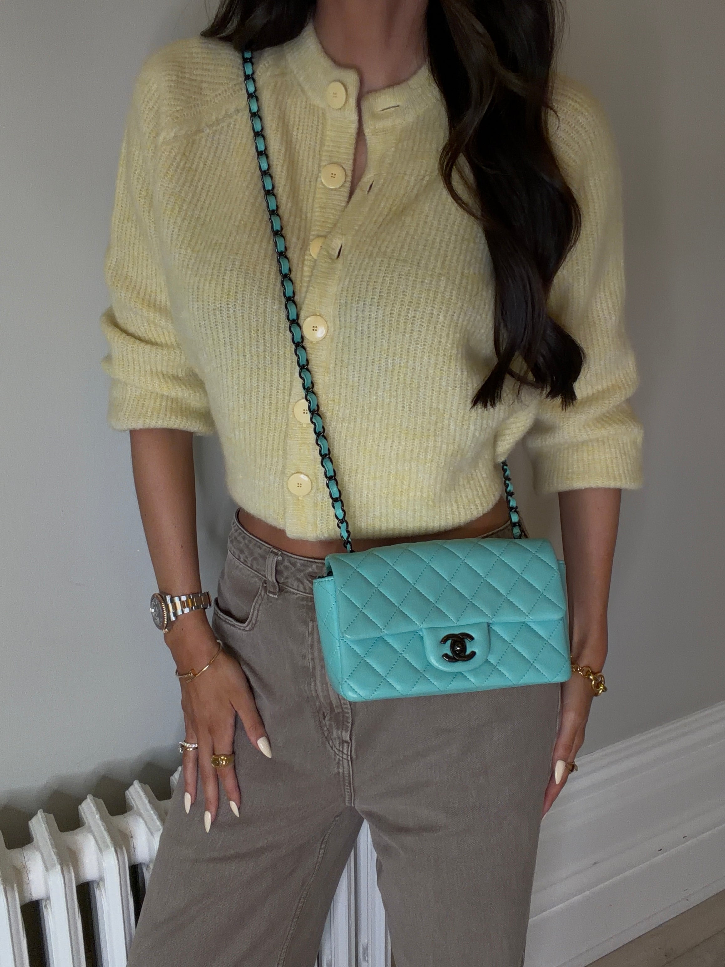 Authentic and preloved Chanel Mini Rectangle Flap Bag In Turquoise Lambskin Leather With Gunmetal Hardware In Excellent condition. Verified by Luxe Cheshire. 100% Authenticity Guarantee. 