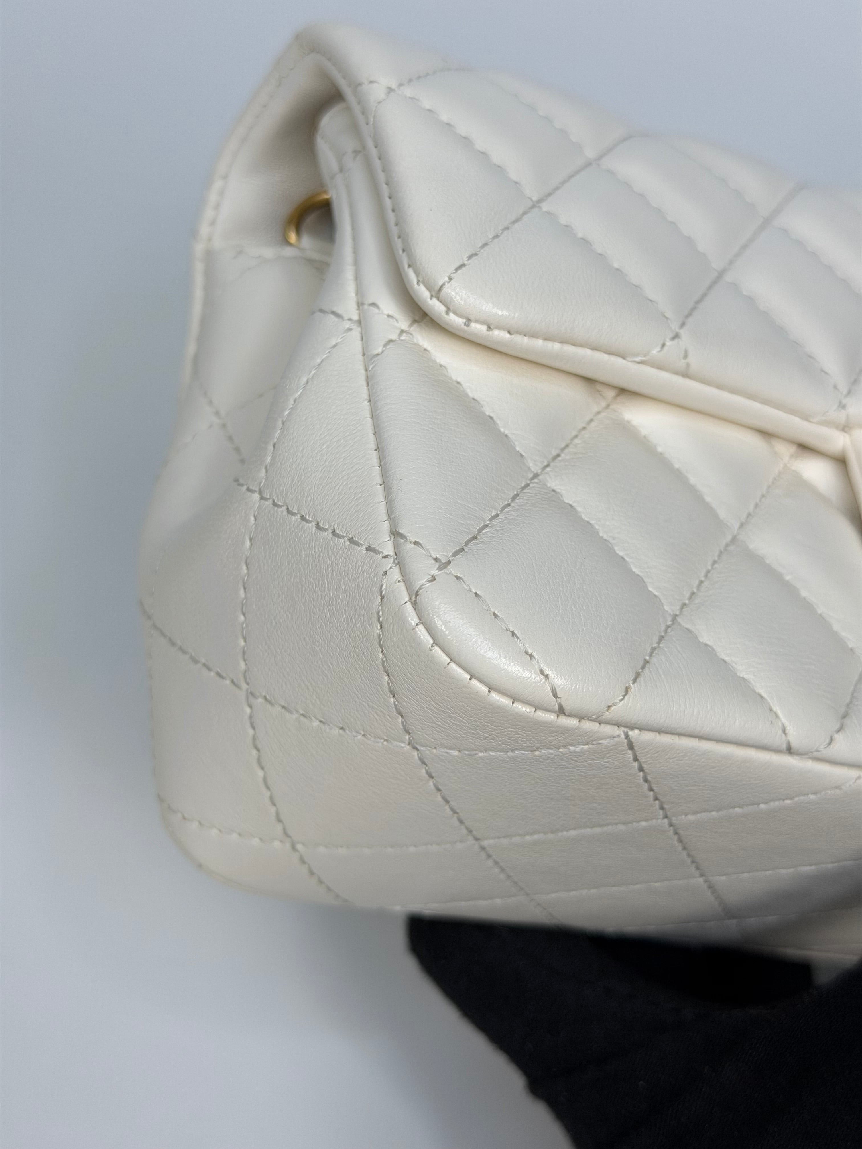 Chanel Pearl Crush Mini Rectangle In White Lambskin Leather Gold Hardware. Authentic and preloved in excellent condition with 100% authenticity guarantee.