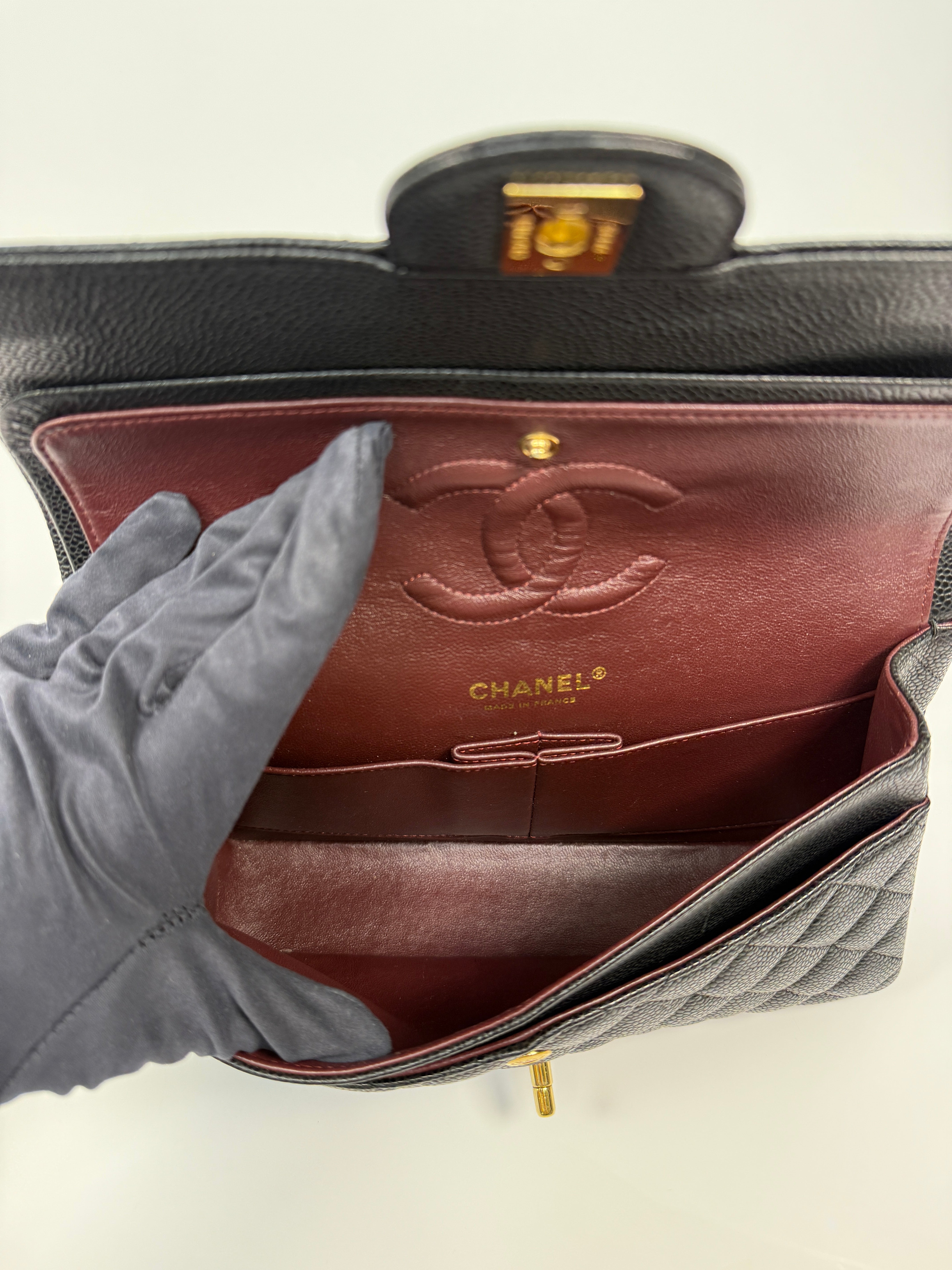 Chanel Medium Classic Double Flap Black CaviarWith Gold Hardware
Pre Loved & Authentic 