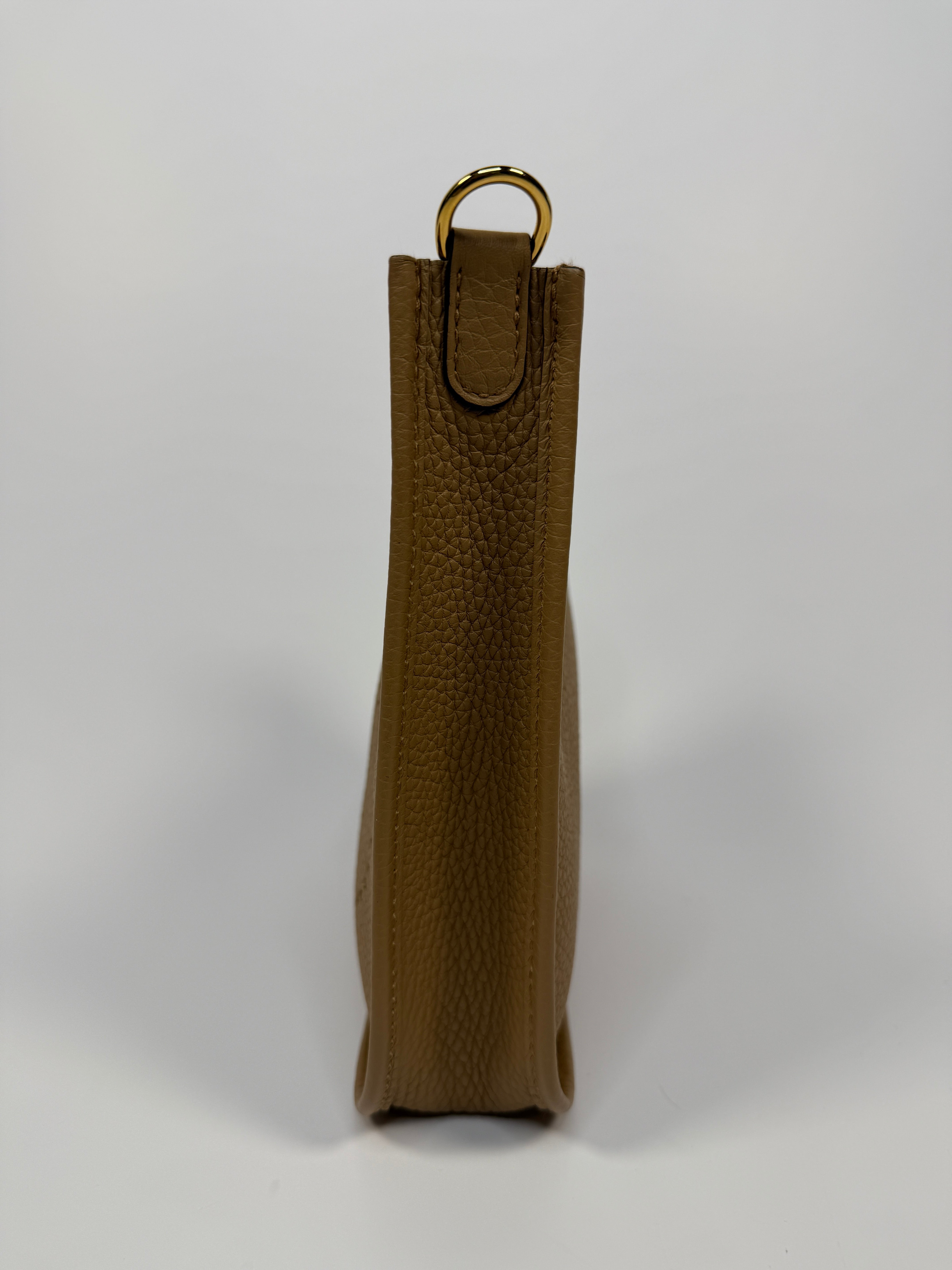 Hermès Evelyne TPM In Chai Clemence Leather With Gold Hardware. Authentic and preloved in excellent condition.