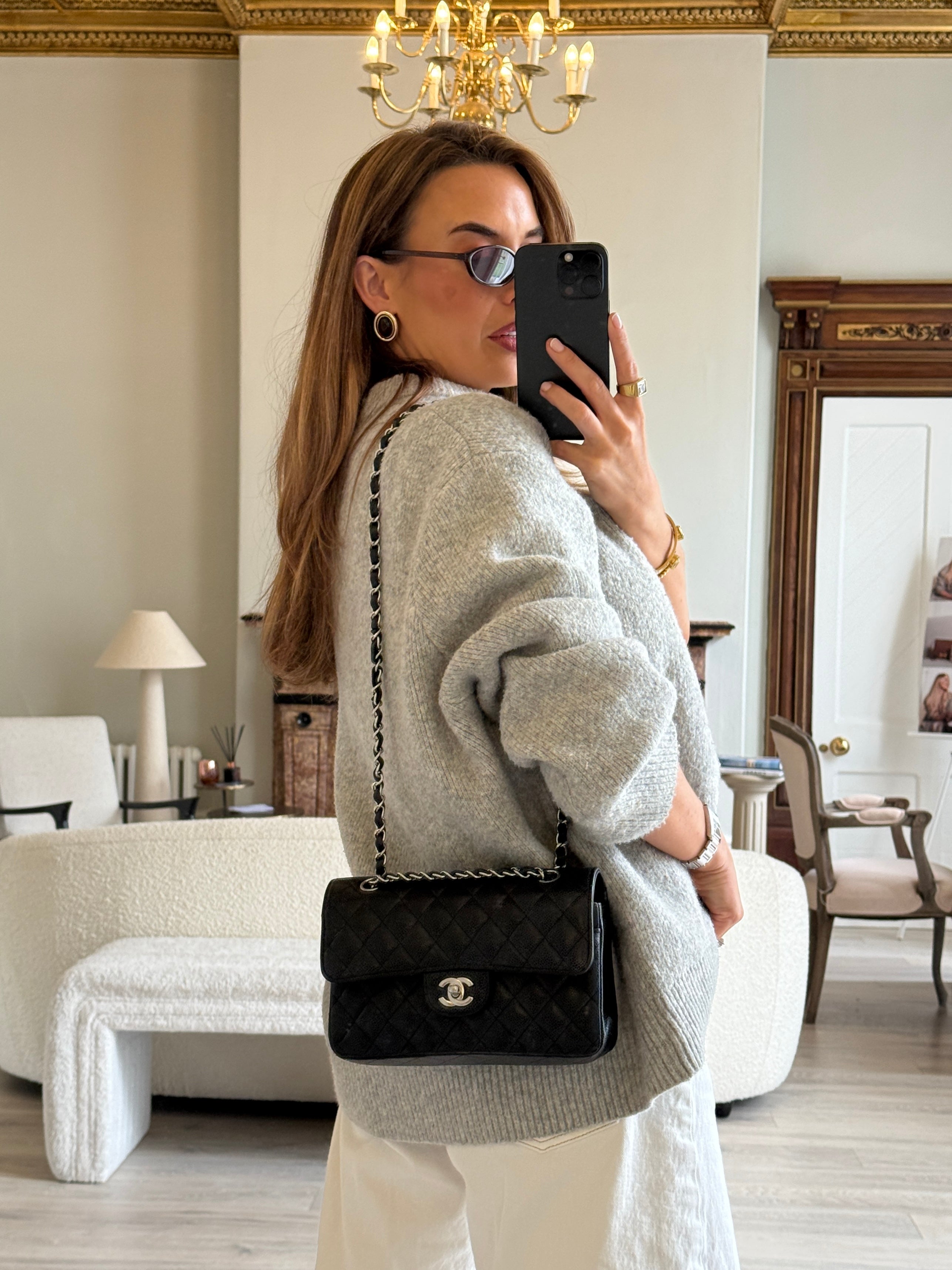 Chanel Small Classic Double Flap In Black Caviar Leather With Silver Hardware. Authentic and preloved in very good condition. 100% Authenticity guarantee 