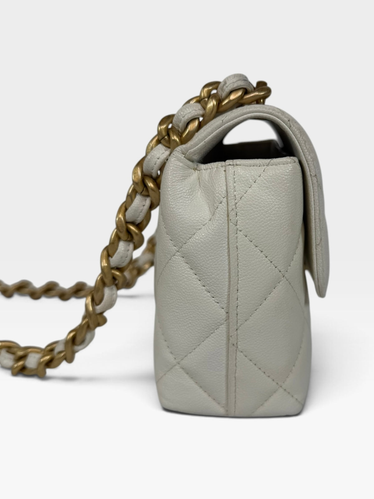 Chanel Mini Flap In White Caviar Leather With Gold Hardware 100% authentic and preloved in excellent condition
