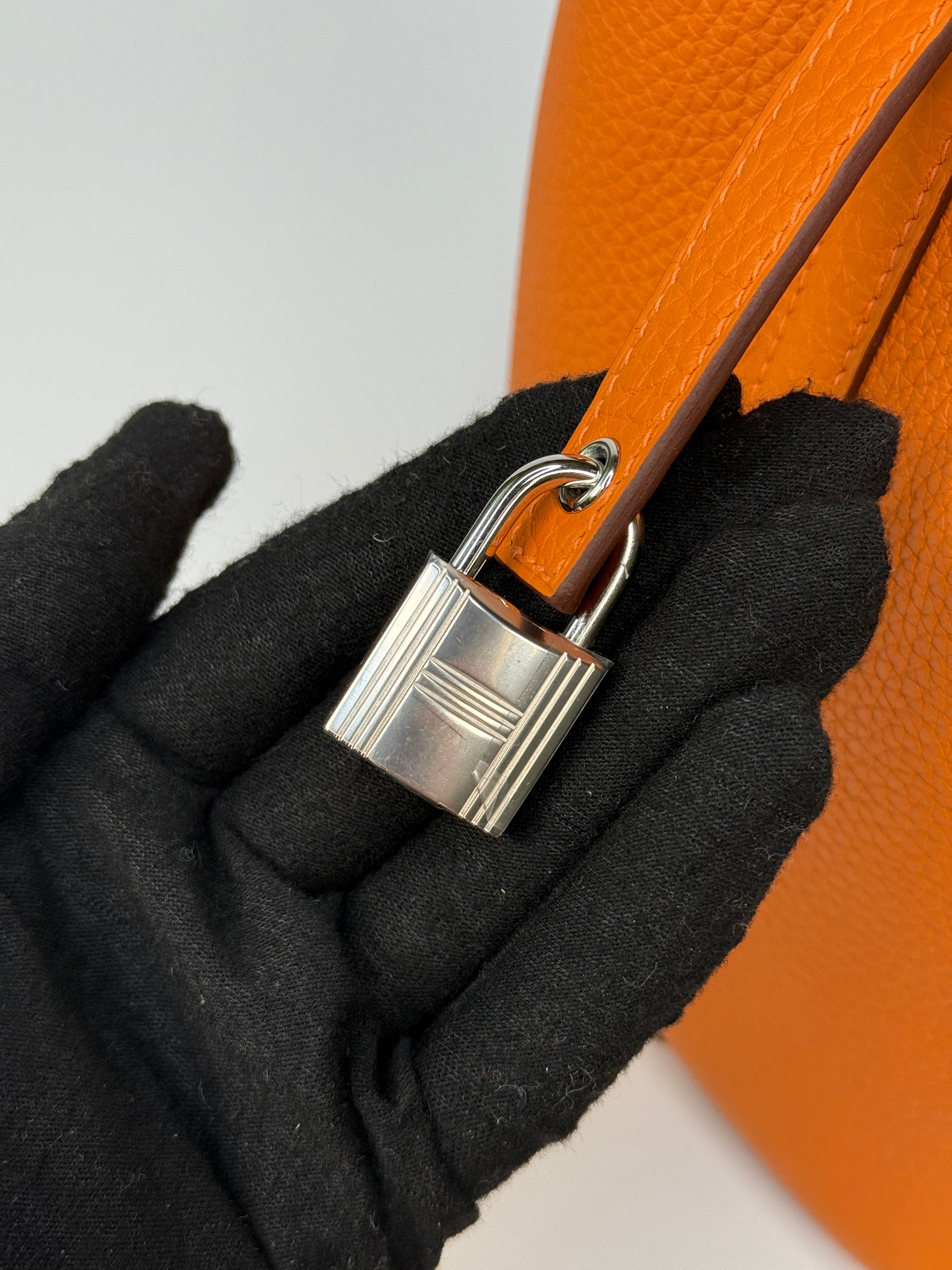 Hermès Picotin 18 In Orange Clemence Leather With Palladium Hardware
Authentic Pre Loved Verified by Luxe Cheshire Trusted Designer resale