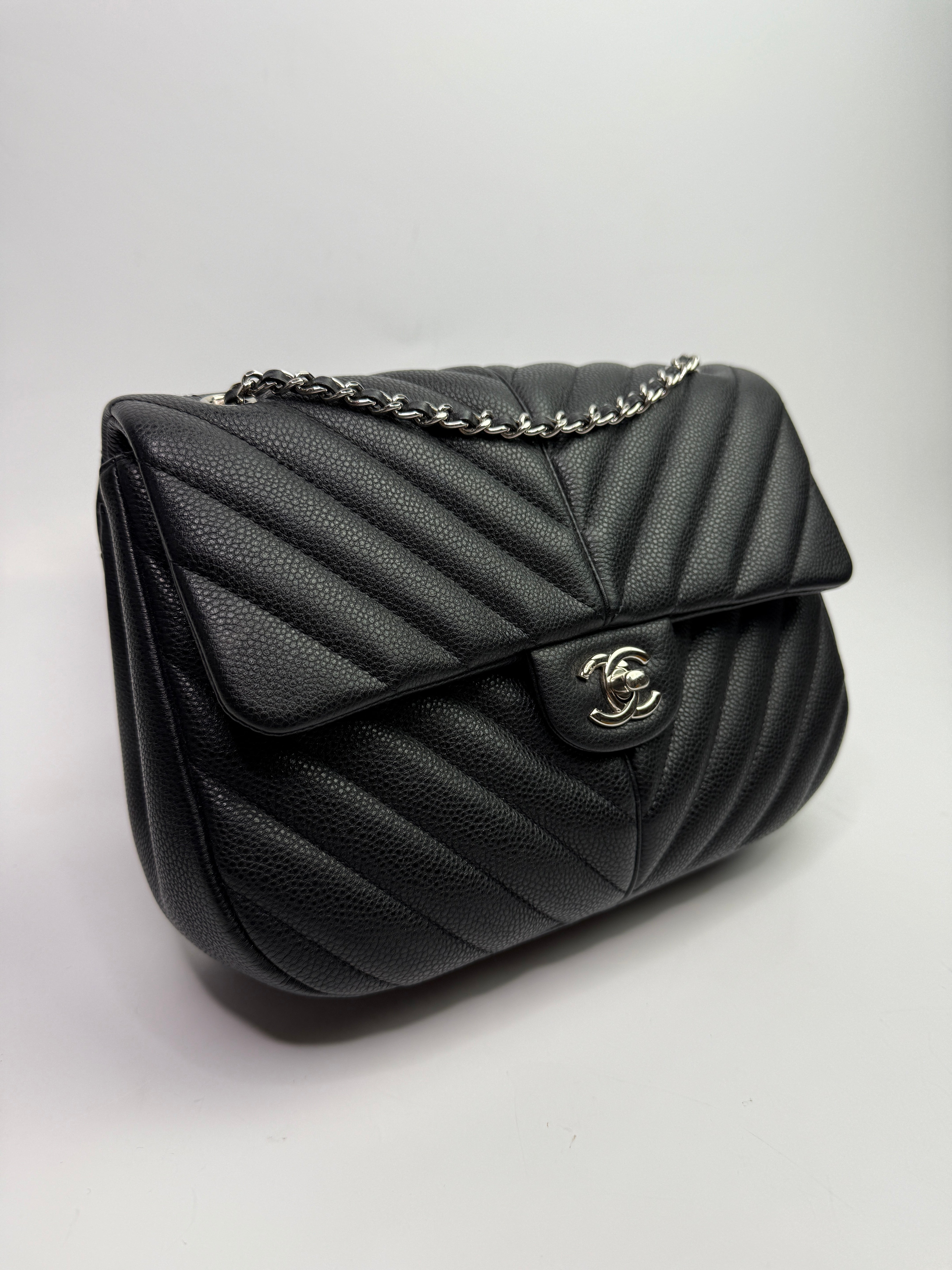 Chanel Seasonal Flap Bag In Black Chevron Caviar Leather With SHW