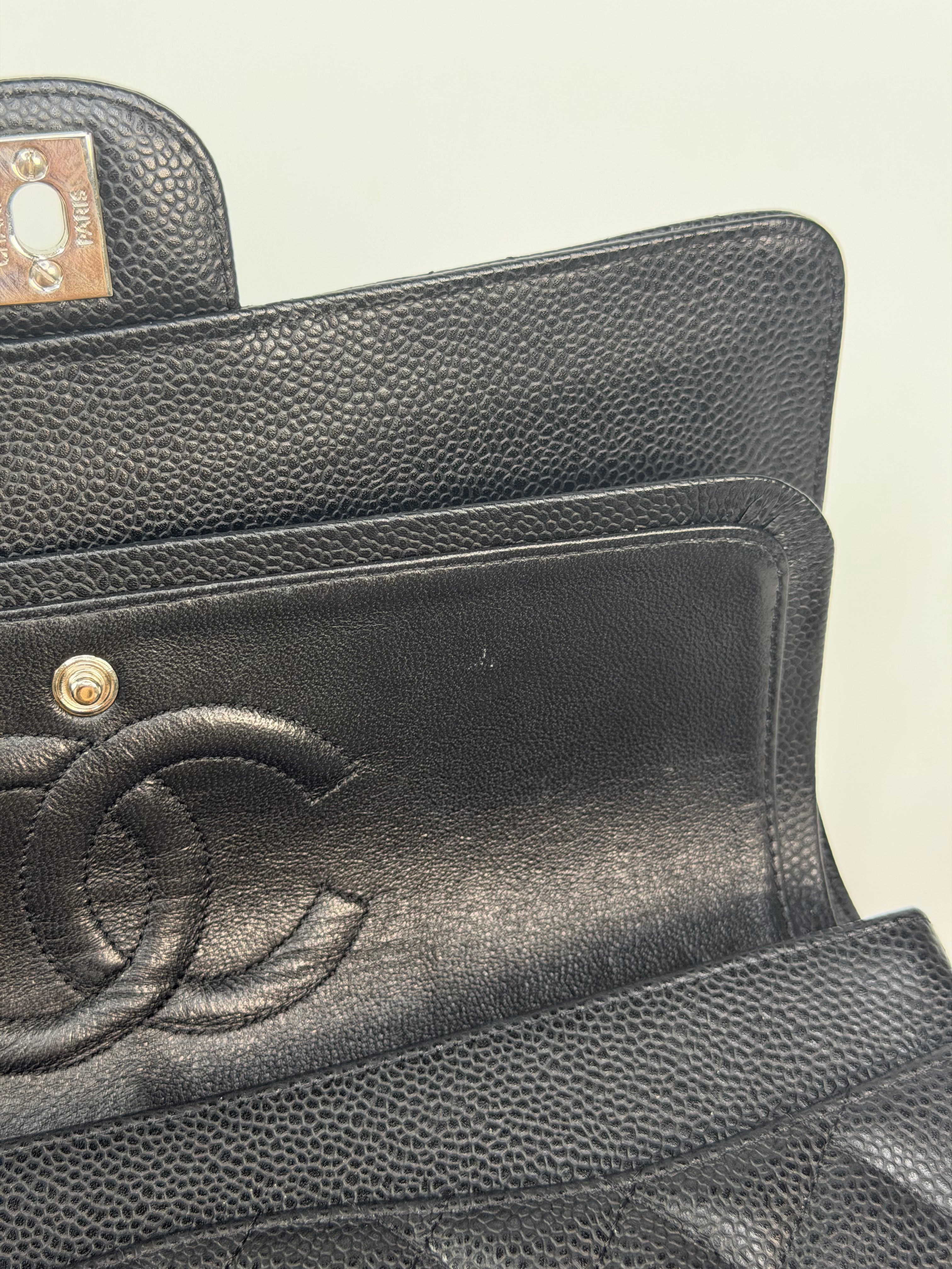 Chanel Vintage Medium Classic Double Flap Black Caviar Silver Hardware. 100% authentic and preloved in excellent condition