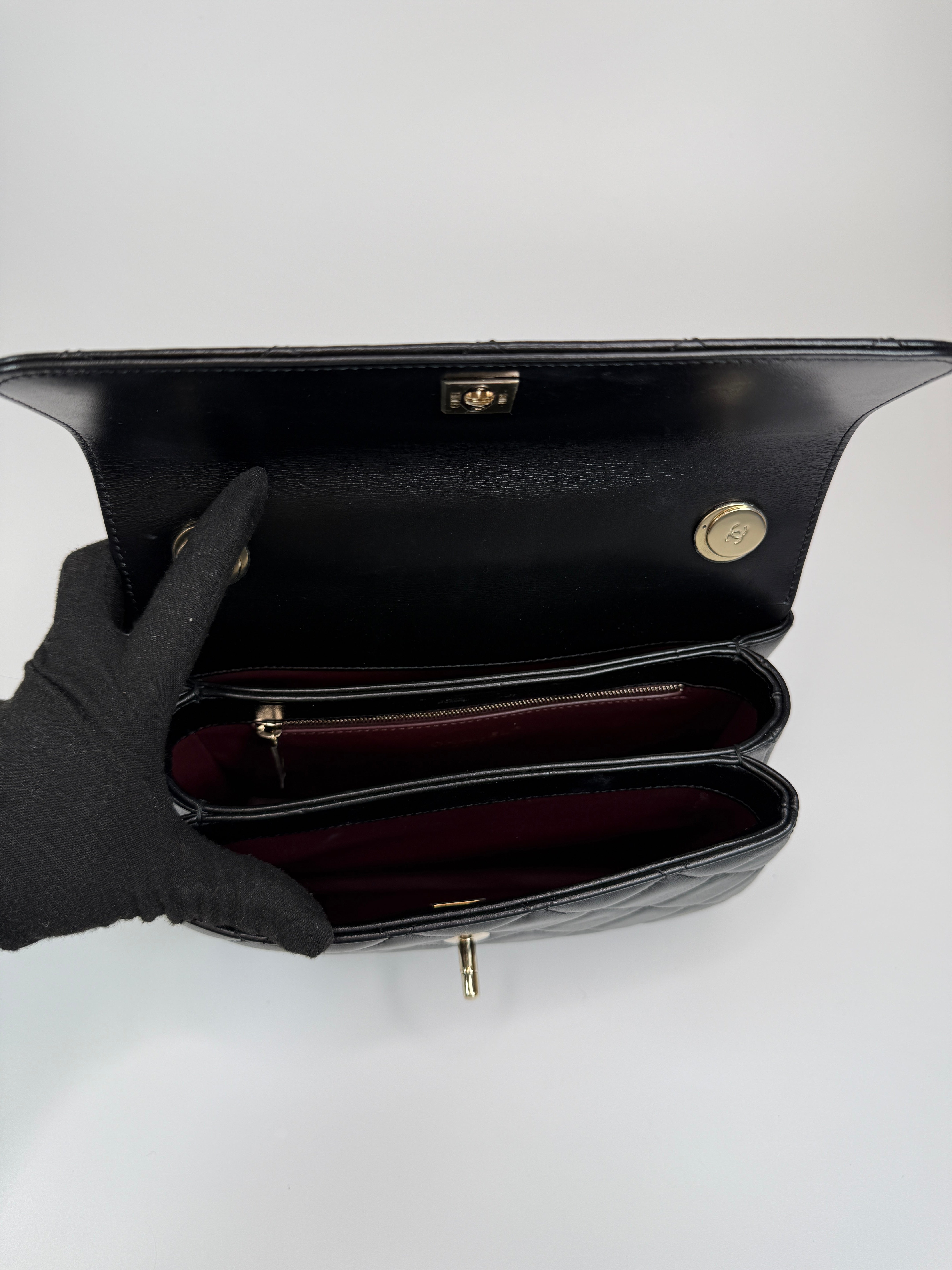 Authentic and preloved Chanel Trendy Top Handle Flap Bag In Black Lambskin With Gold Hardware. Excellent condition. 100% Authenticity guarantee 