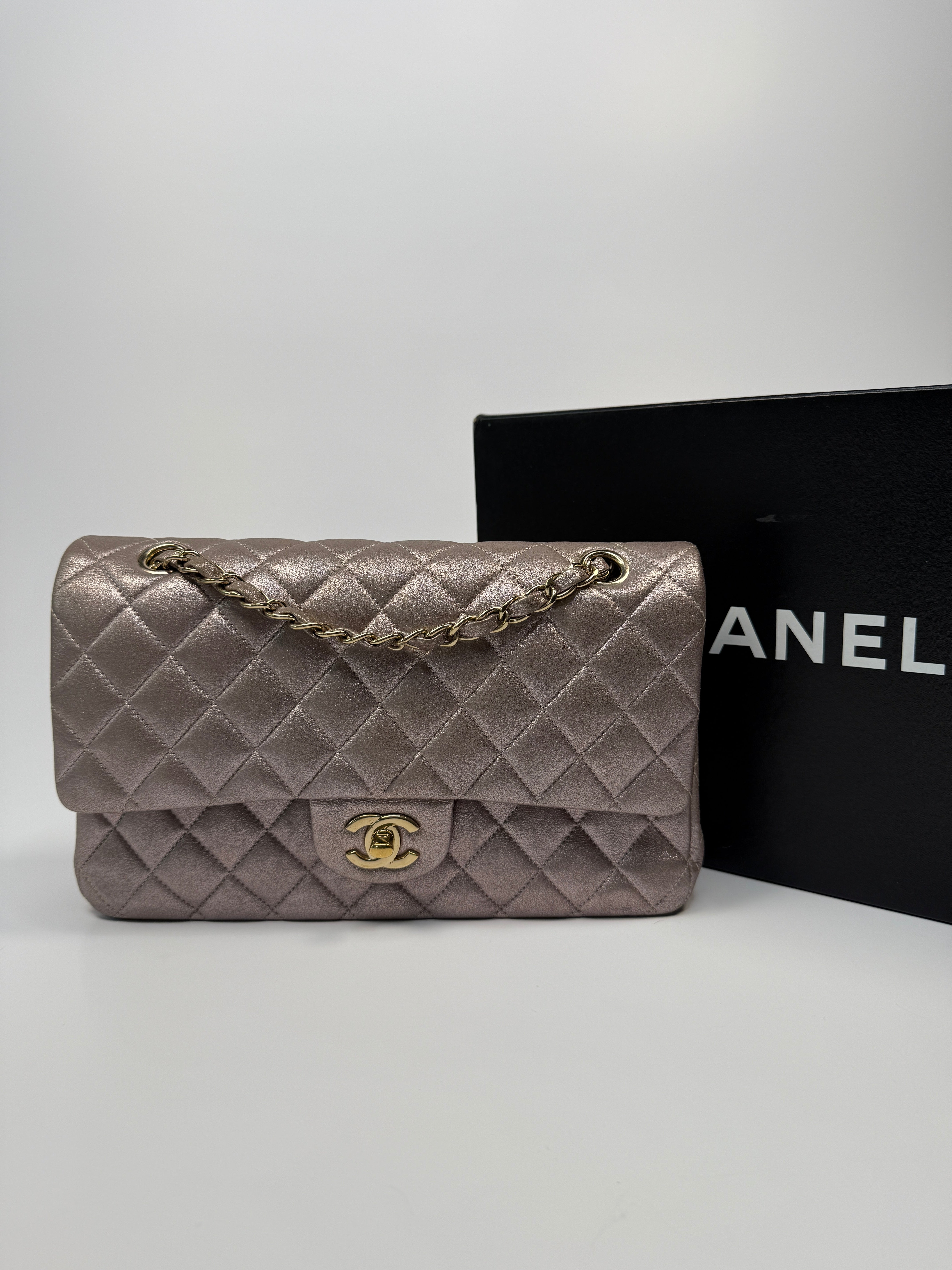 Authentic pre-loved Chanel Iridescent Rose Medium Classic Double Flap With Gold Hardware.