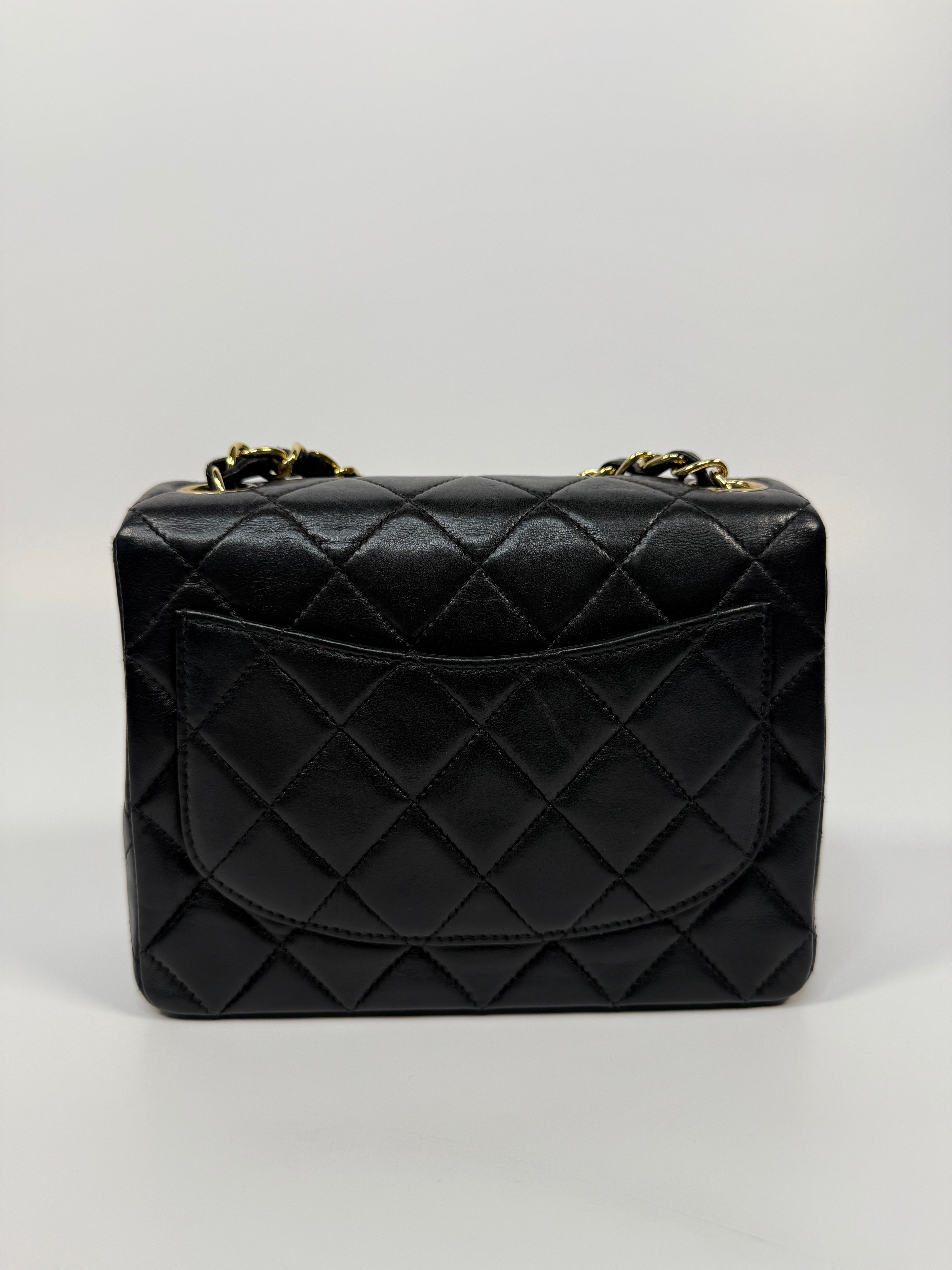 Chanel Black Square Vintage Flap Bag In Lambskin With Gold Hardware
Pre Loved & Authentic 