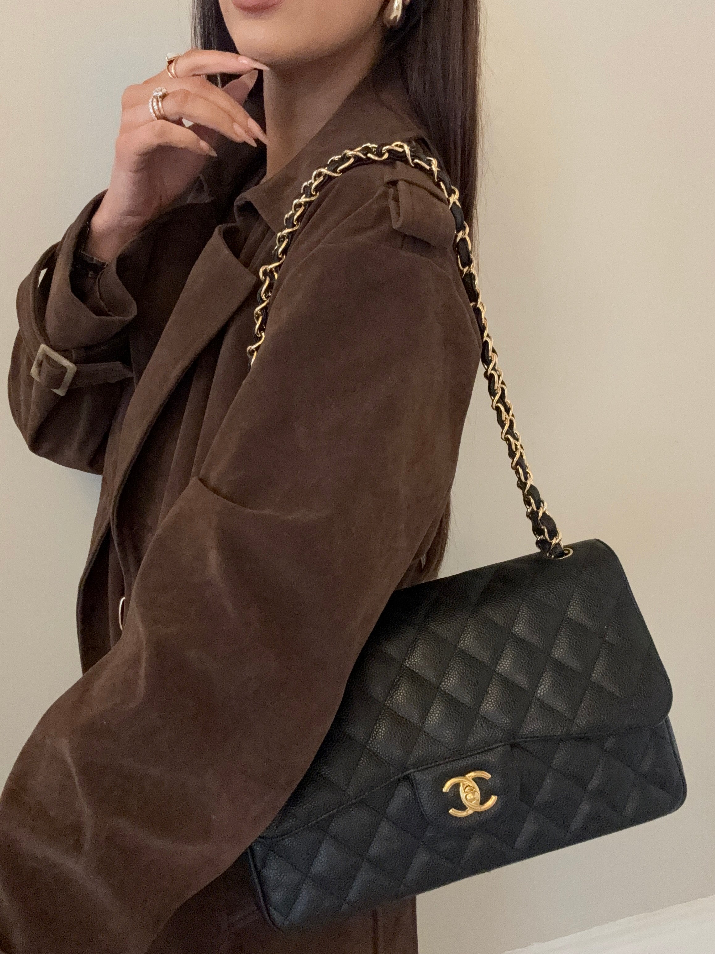 Chanel Jumbo Classic Double Flap In Black Caviar Gold Hardware
Pre Loved & Authentic 
