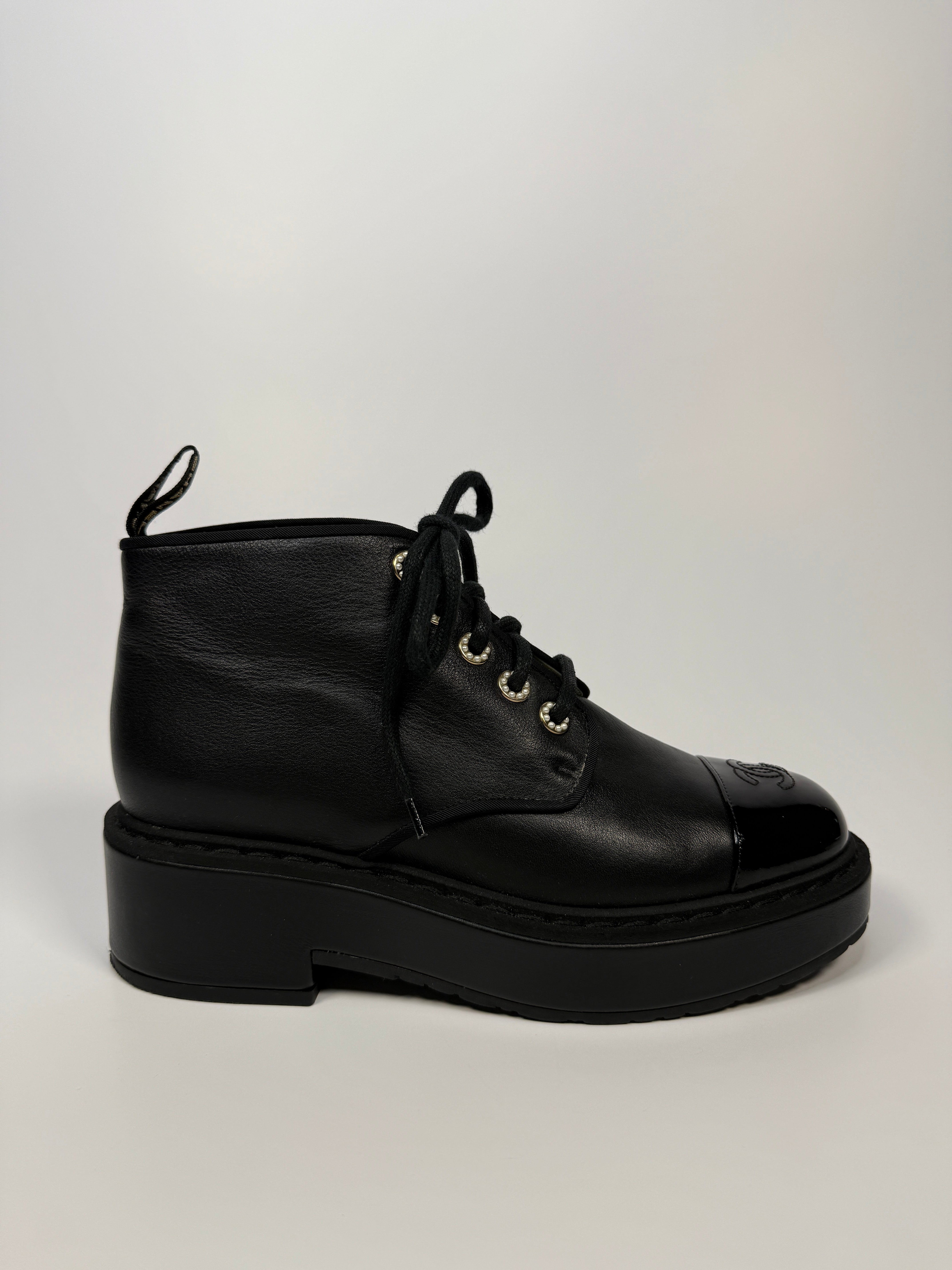 Chanel CC Toe Cap and pearl eyelet Anklet boots In Black Leather. UK6.5 Excellent. Authentic and preloved. 