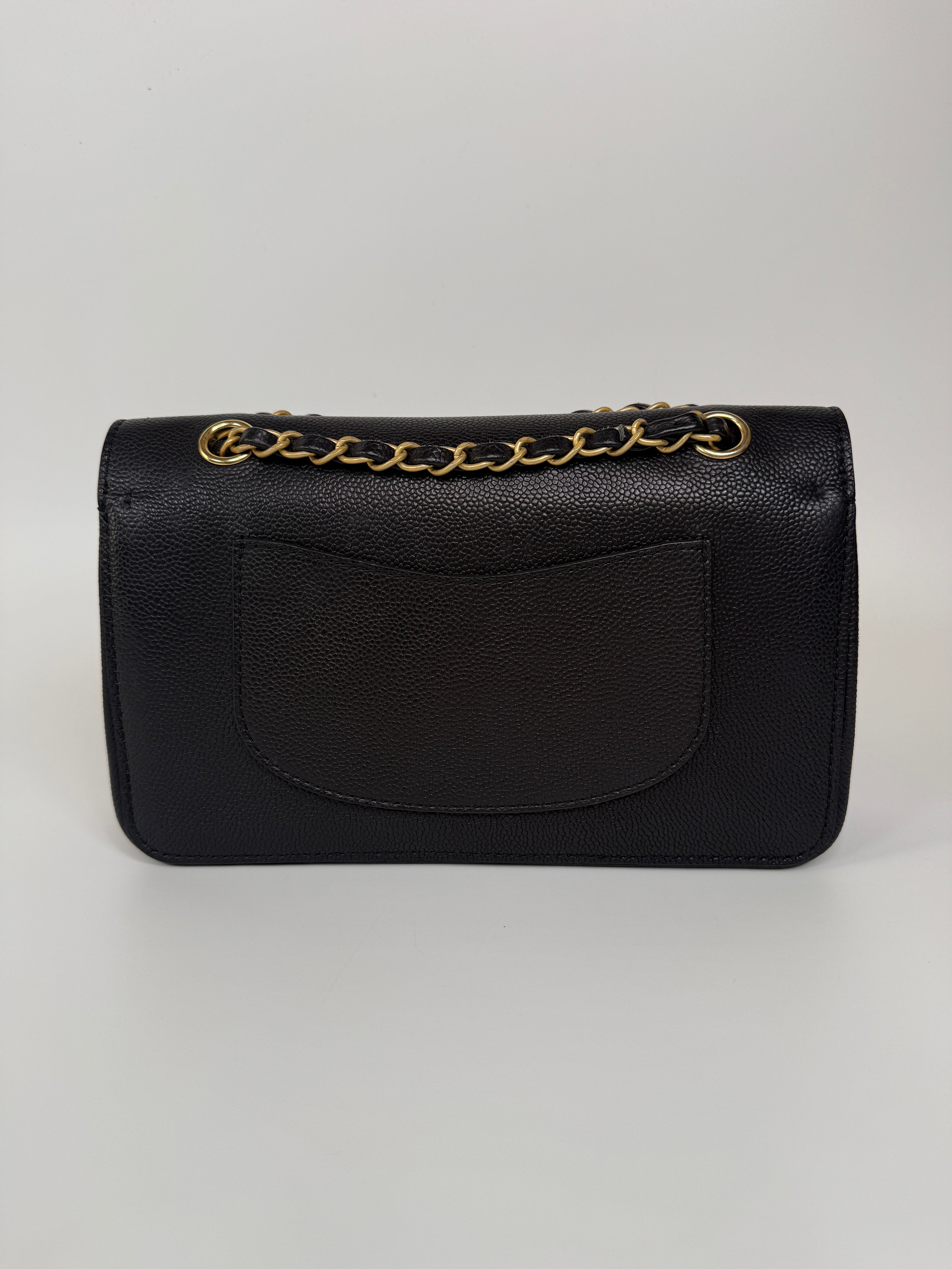 Authentic and preloved Chanel Medium Pure Timeless Flap Black In Black Caviar Leather With Gold Hardware. 100% Authenticity Guarantee 