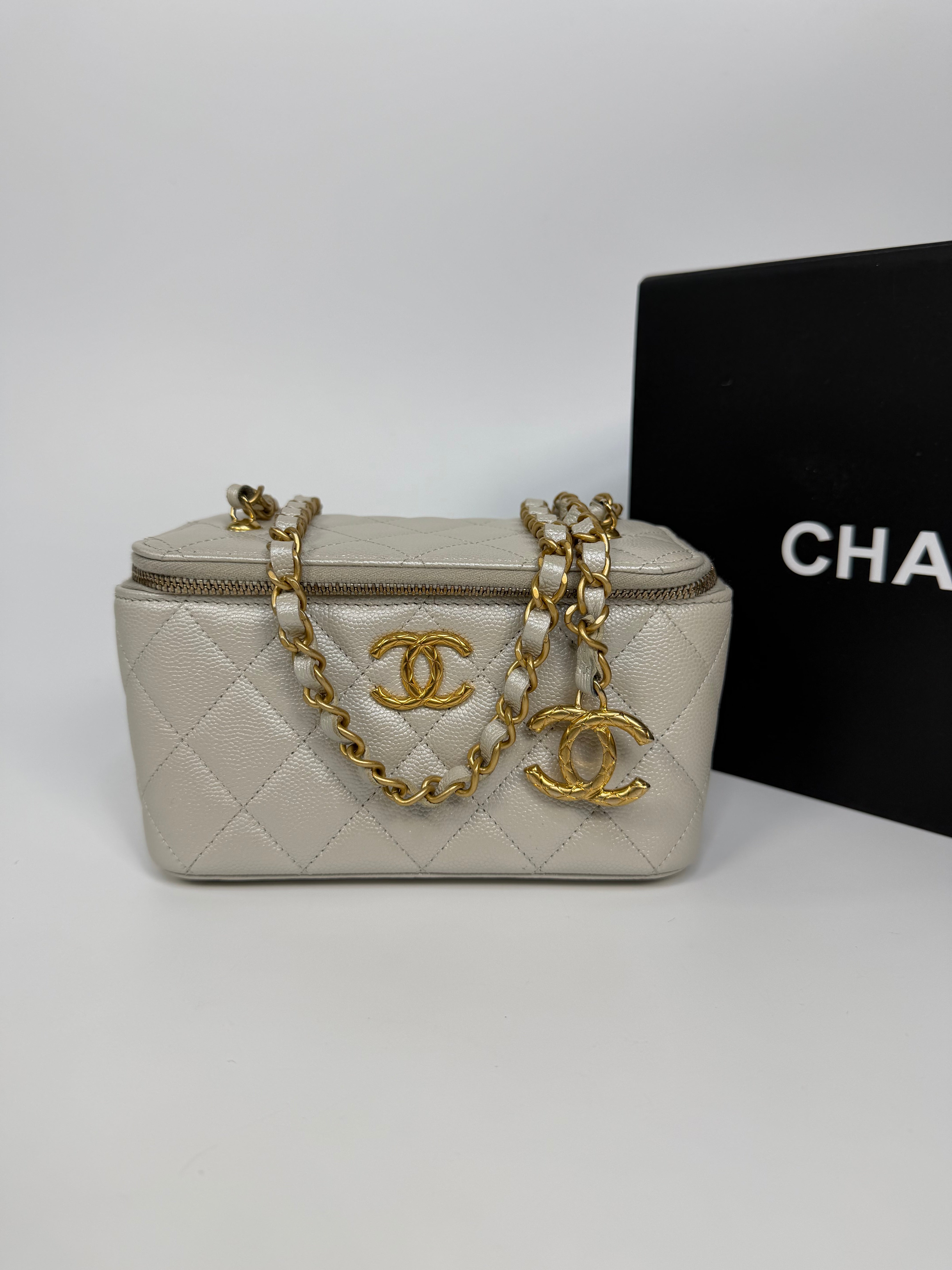 Chanel  Vanity In Light Pearl Grey Caviar Leather With Gold Hardware. Authentic and preloved in excellent condition.