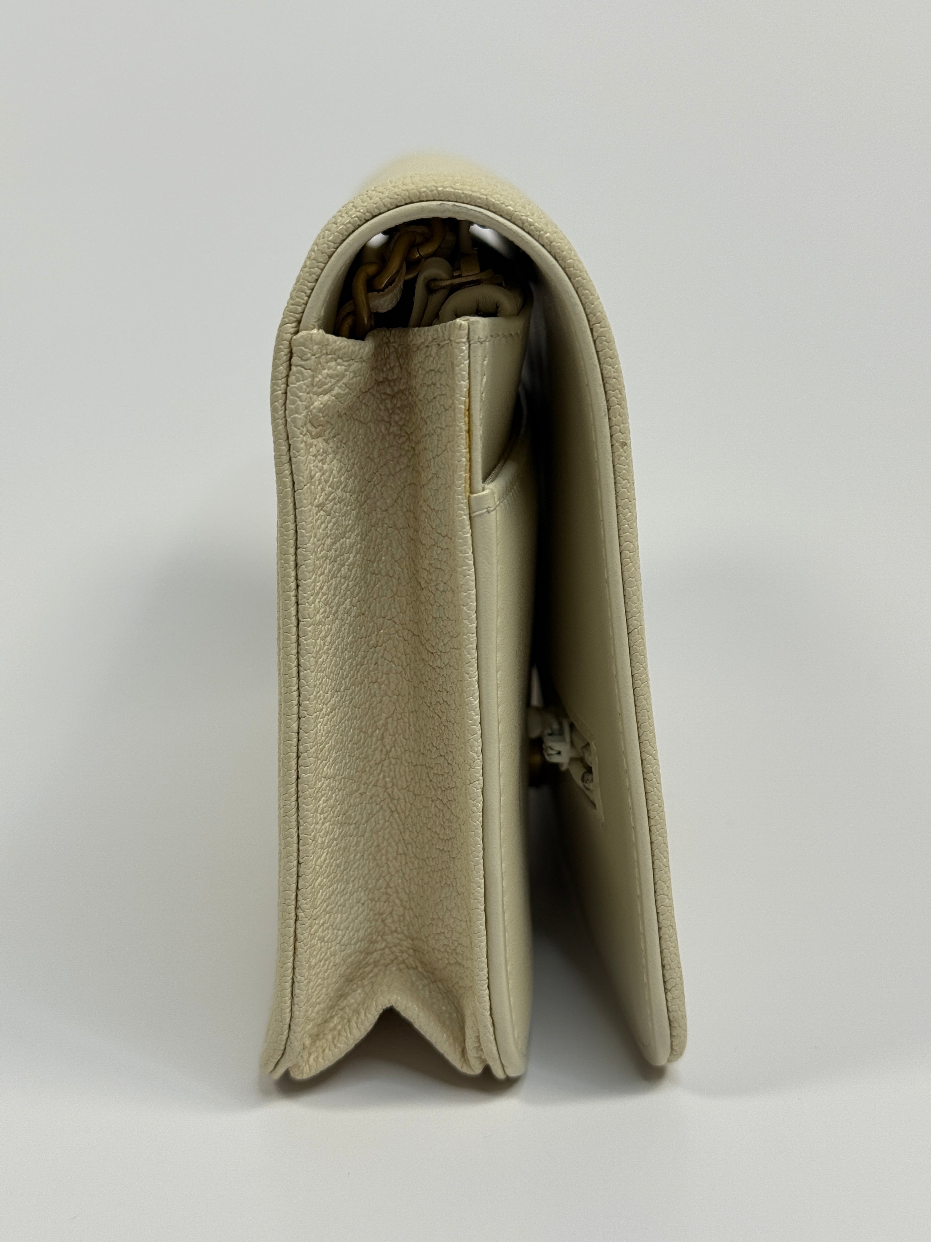 Authentic and pre loved Chanel Boy Wallet On Chain In White Caviar Leather With Gold Hardware. Excellent Condition