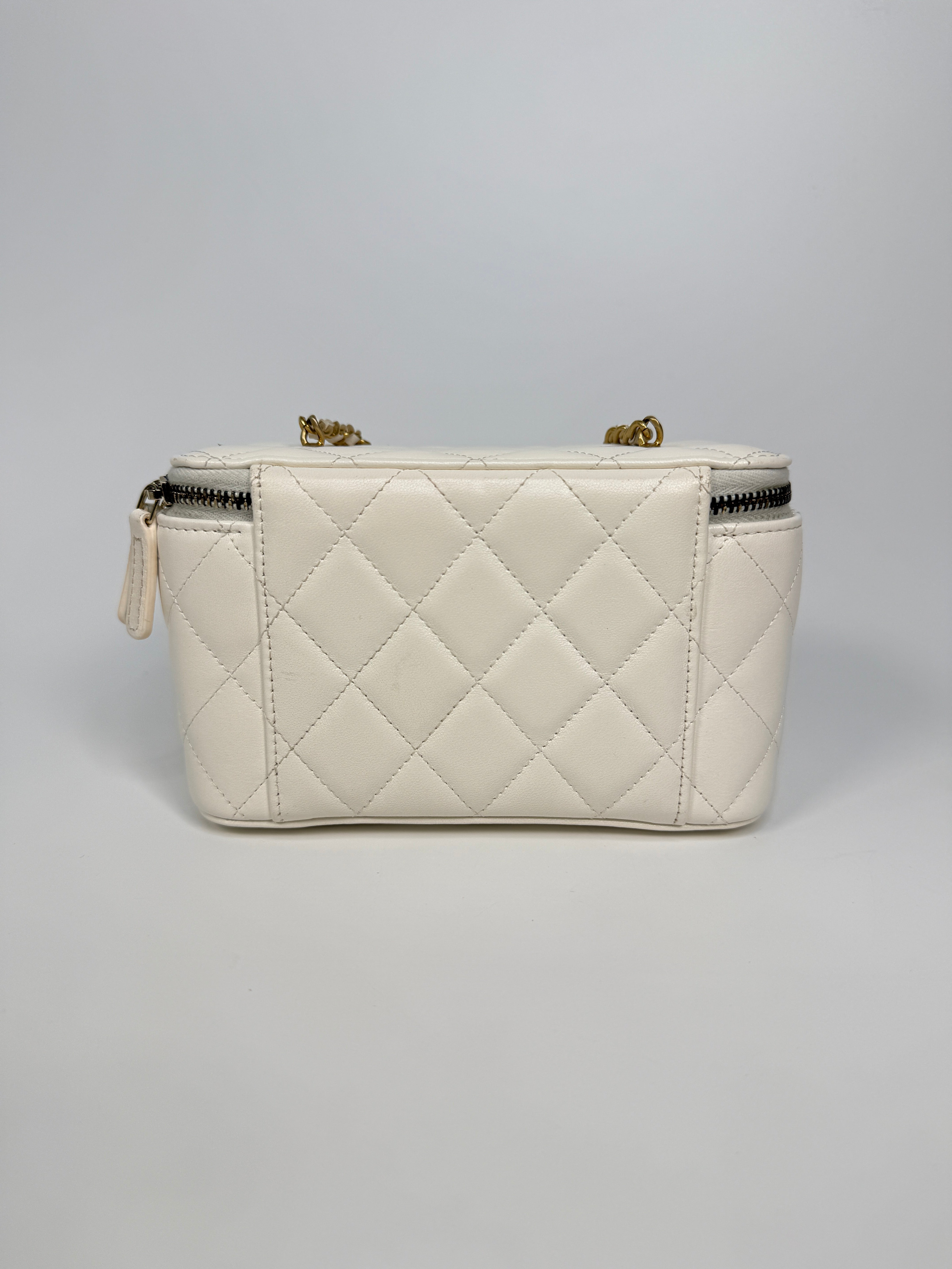 Authentic and preloved Chanel Quilted Pearl Crush Mini Vanity In White Lambskin Leather With Aged Gold Hardware