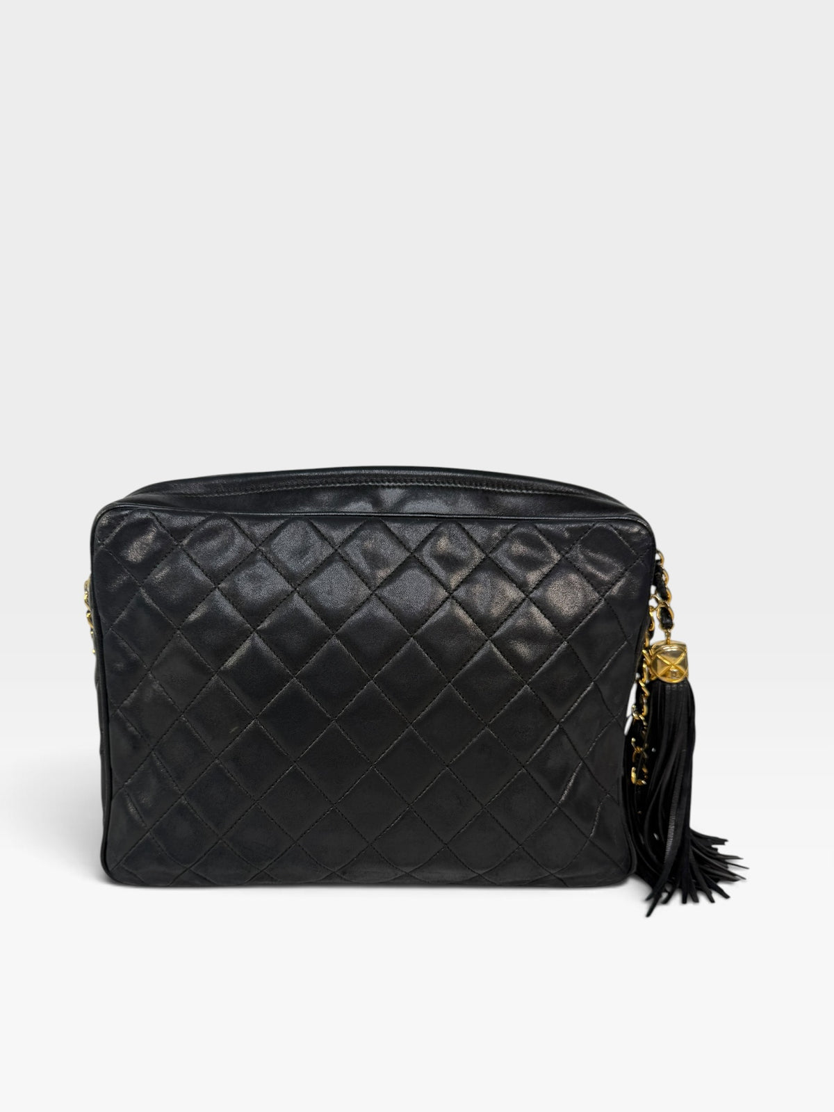Chanel Vintage Quilted Camera Bag In Black Lambskin With 24kt Gold Hardware 100% authentic and preloved in excellent condition