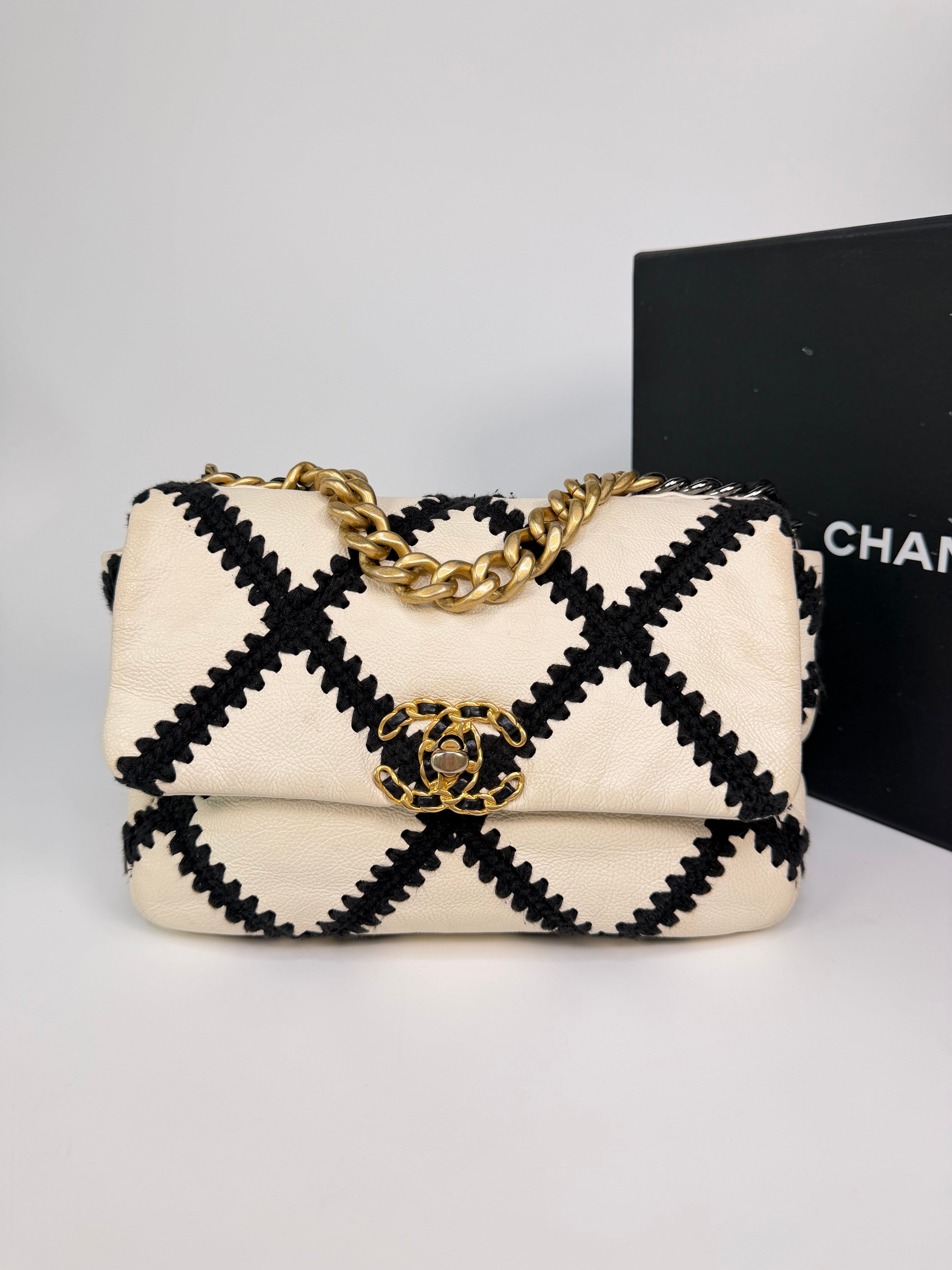 Chanel 19 Small In Black & White Leather With Mixed Hardware. Authentic and preloved in very good condition. 100% Guarantee