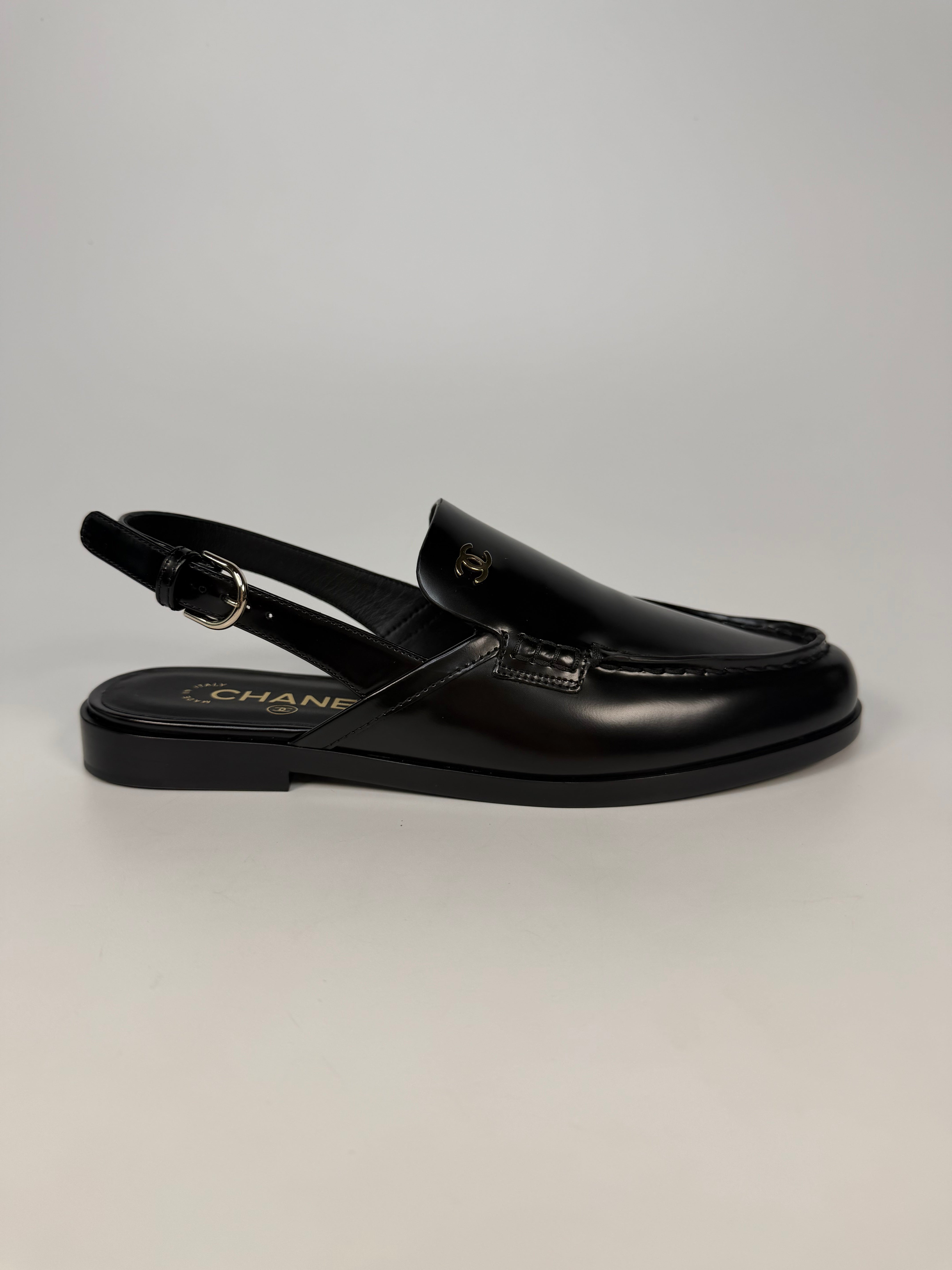 Chanel Spring/Summer Slingback In Black Shiny Calfskin (Size 38.5). Authentic and preloved in new/unused condition. verified by luxe cheshire. insured next day delivery