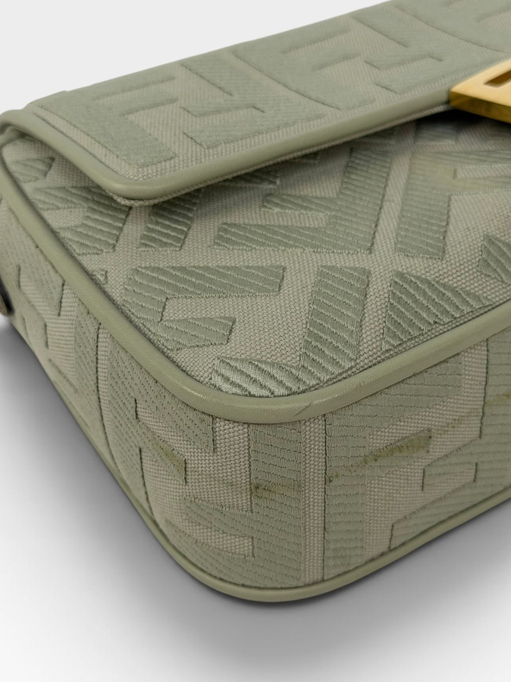 Fendi Baguette In Green Tea FF Monogram Fabric and Canvas With Gold Hardware. 100% authentic and preloved in excellent condition