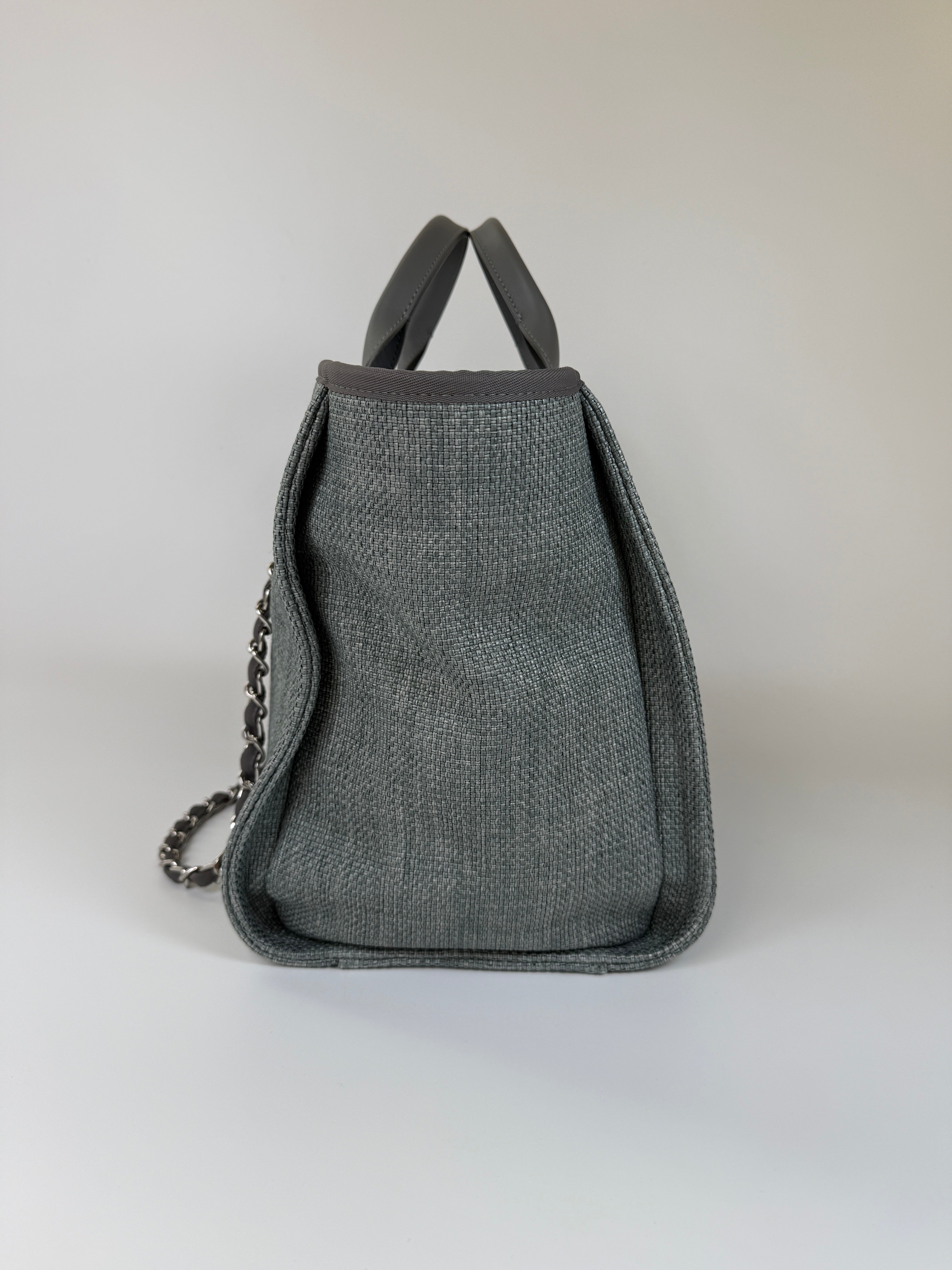 Authentic and preloved Chanel Medium Deauville Tote Bag In Mixed Fibers Rafia Silver Hardware. Excellent condition. 100% Authenticity guarantee 