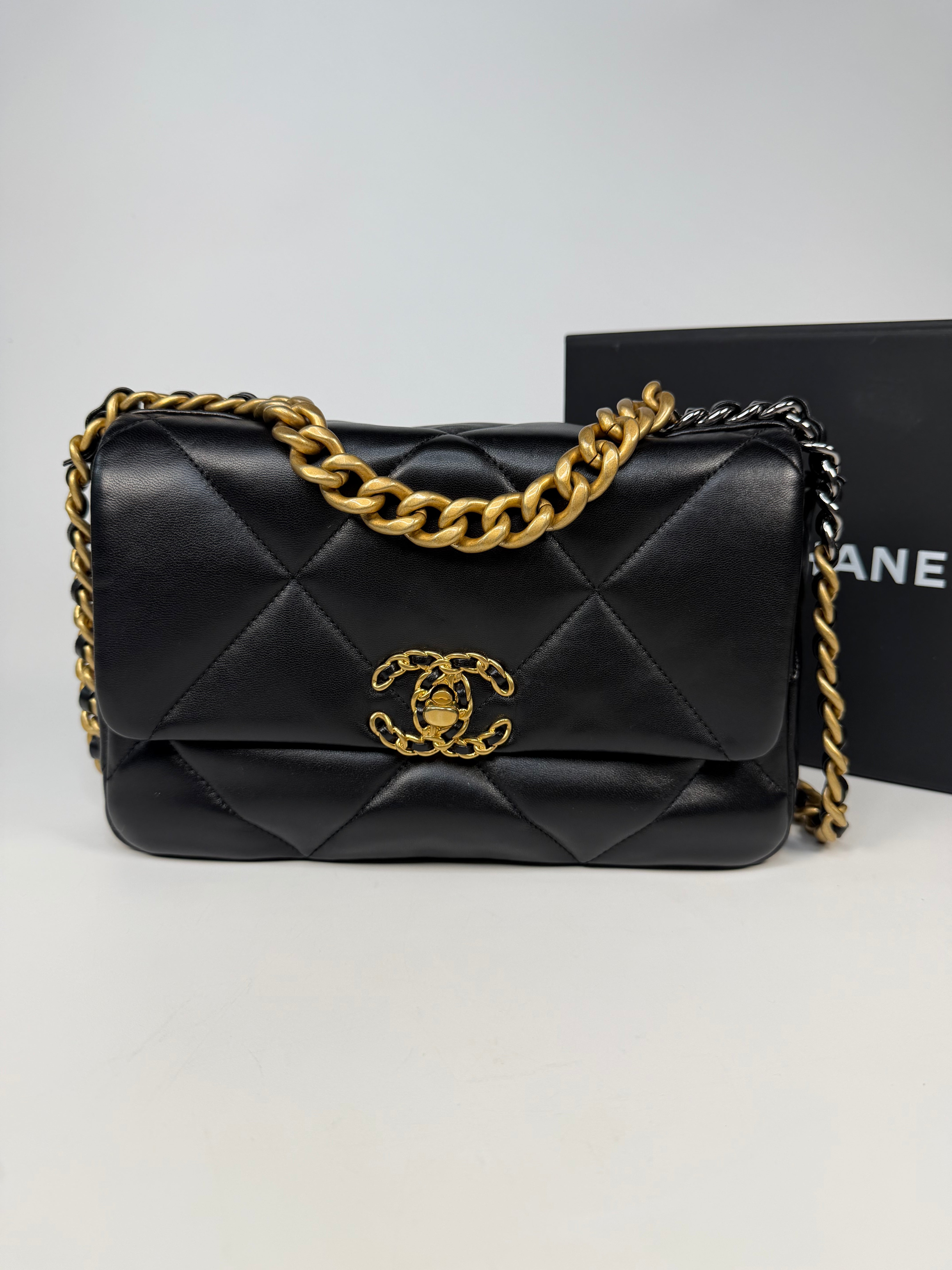 Chanel 19 Small In Black & White Leather With Mixed Hardware. Authentic and preloved in very good condition. Verified by Luxe Cheshire.