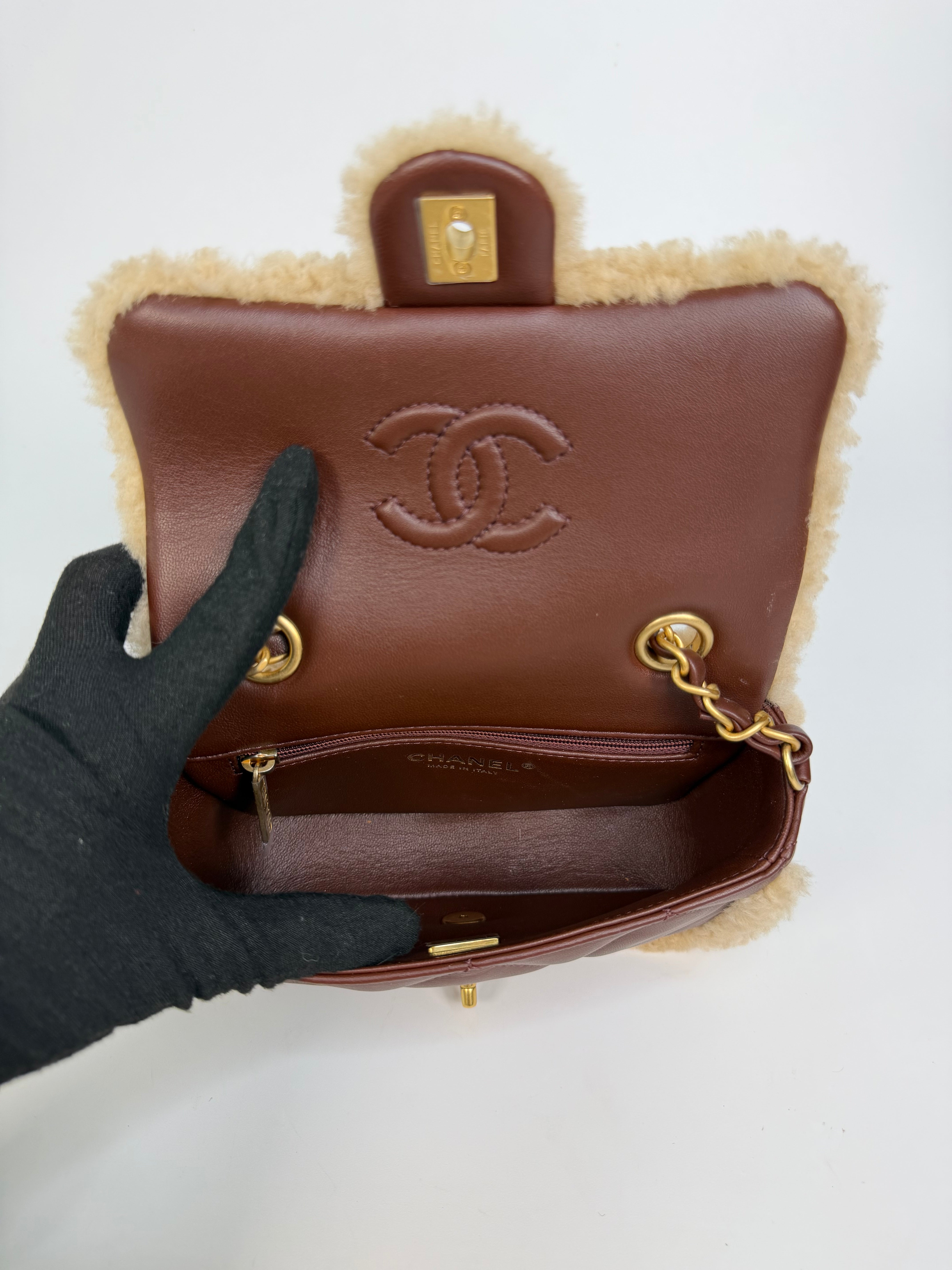 Chanel Mini Rectangle In Brown Lambskin Leather & Shearling With Gold Hardware. Authentic and preloved in excellent condition with 100% authenticity guarantee.