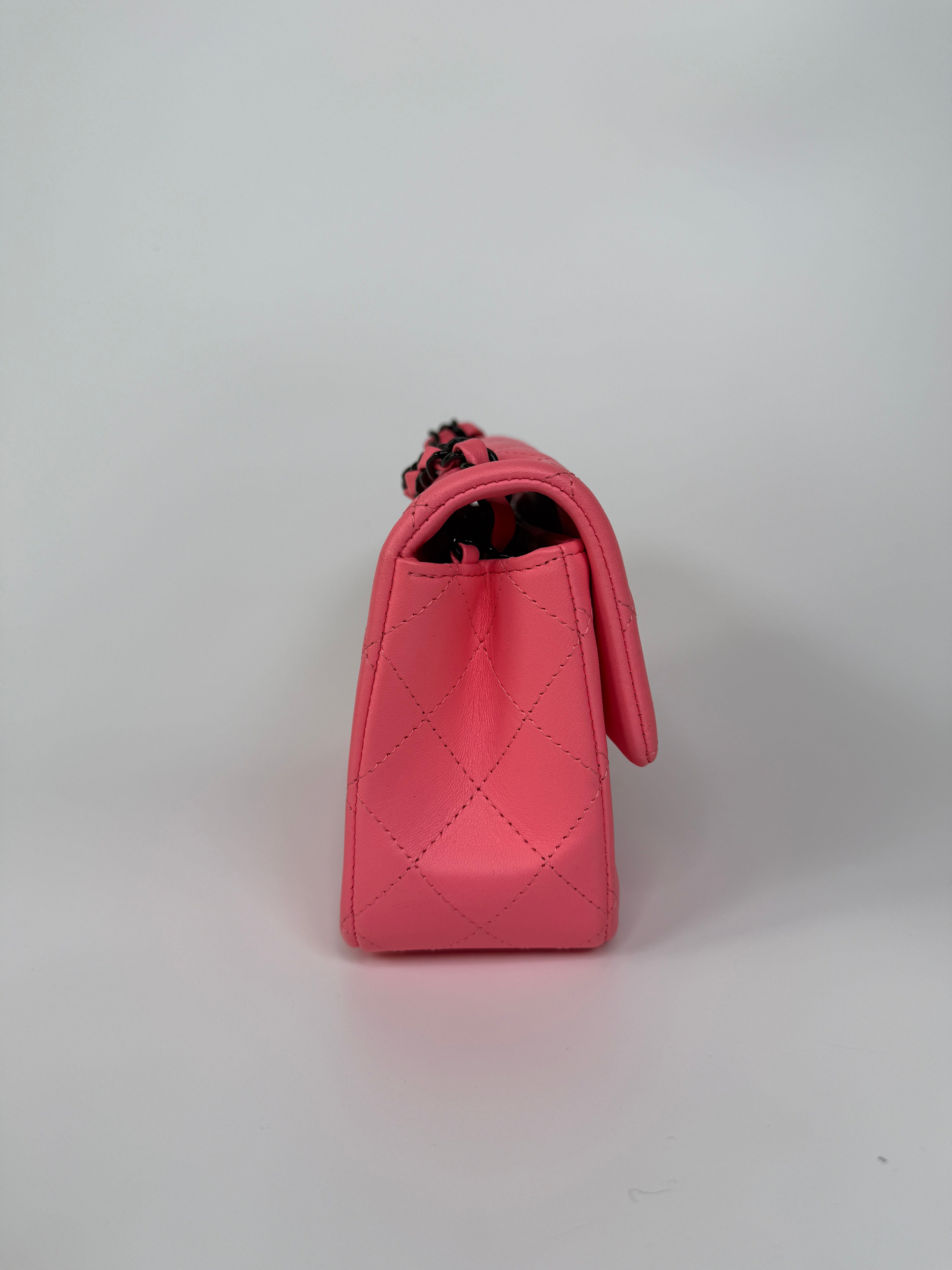 Chanel Mini Rectangle Flap Bag In Pink Lambskin With Black Hardware In Excellent Condition. Authentic and preloved. 