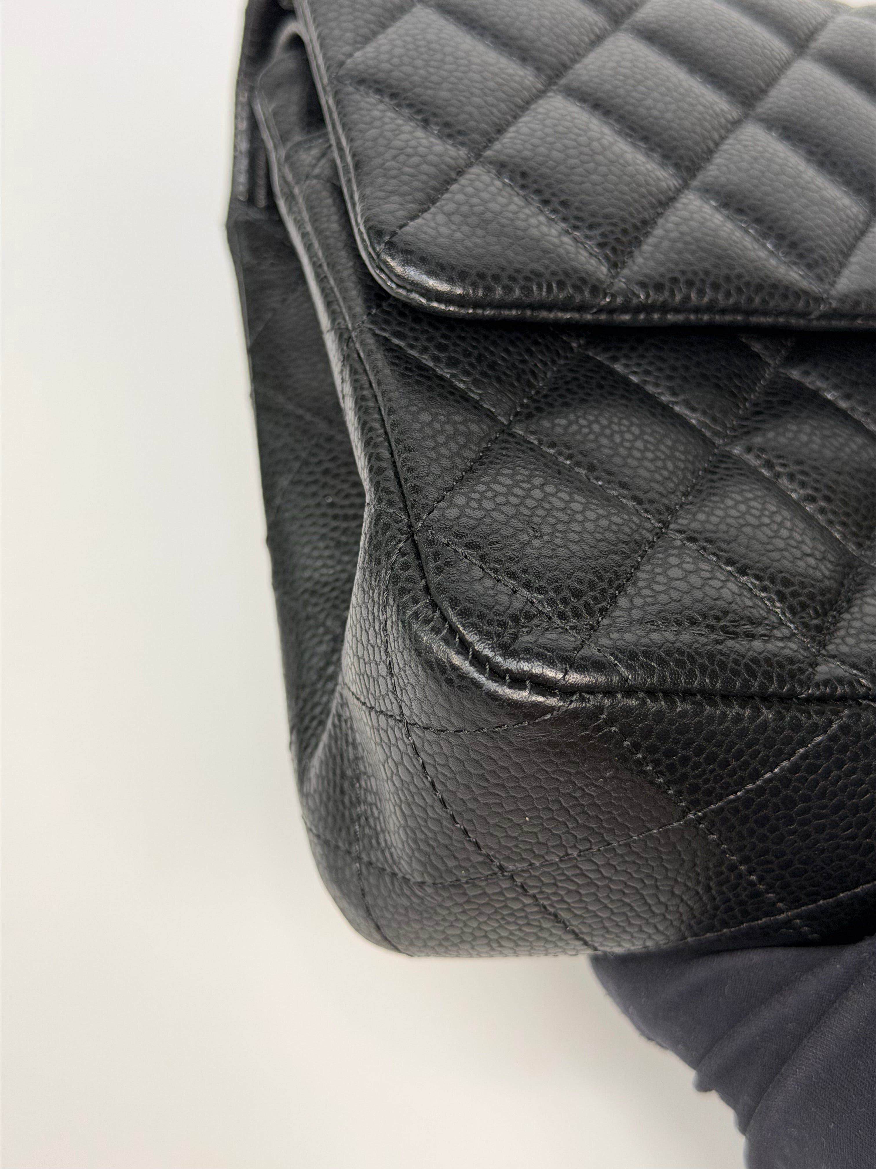 Chanel Medium Classic Double Flap Black Caviar Leather With Gold Hardware. Authentic and preloved in excellent condition