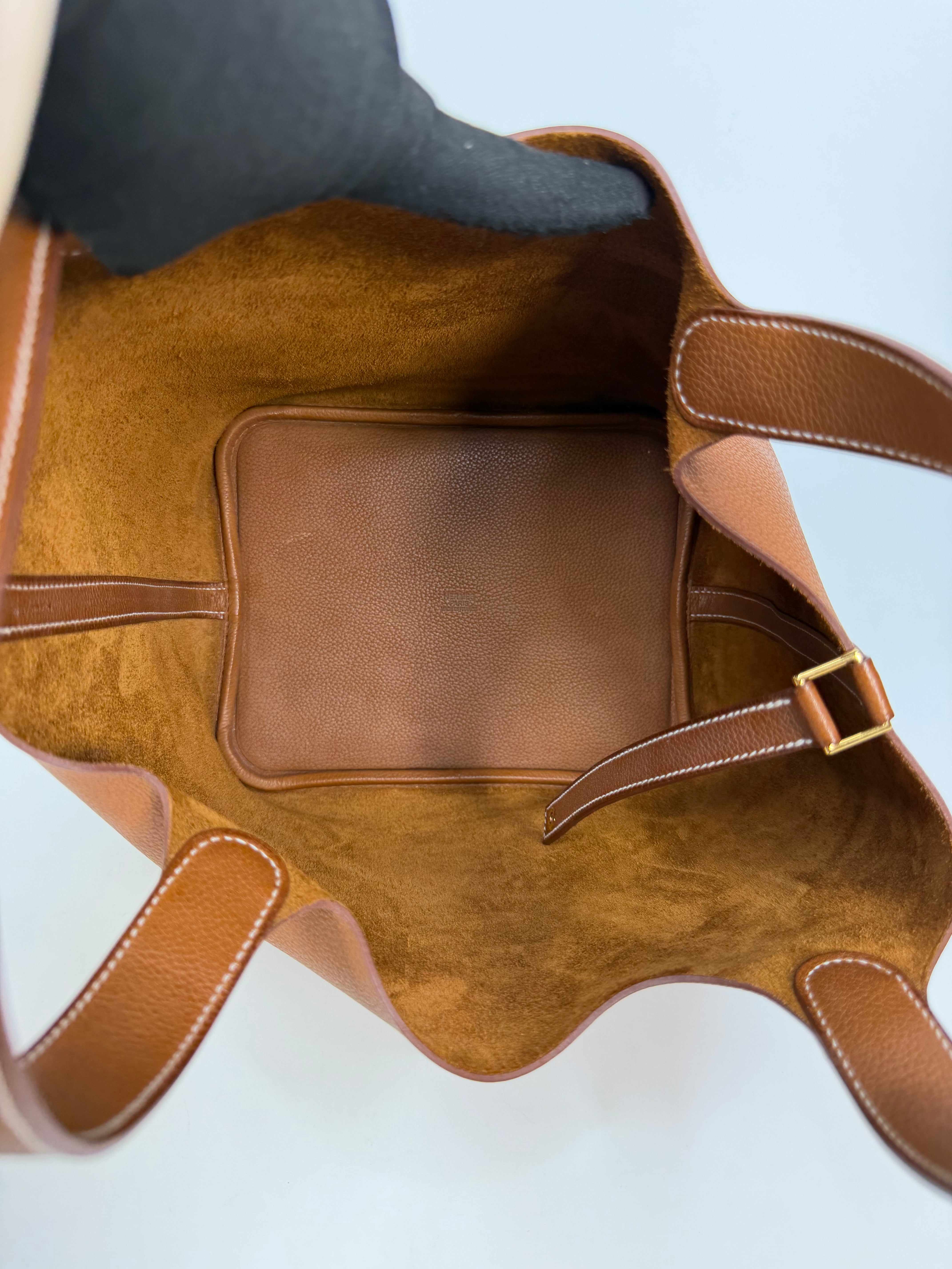 Hermès Picotin 22 In Gold Barenia Fauboug Leather With Gold Hardware. Authentic and preloved in excellent condition
