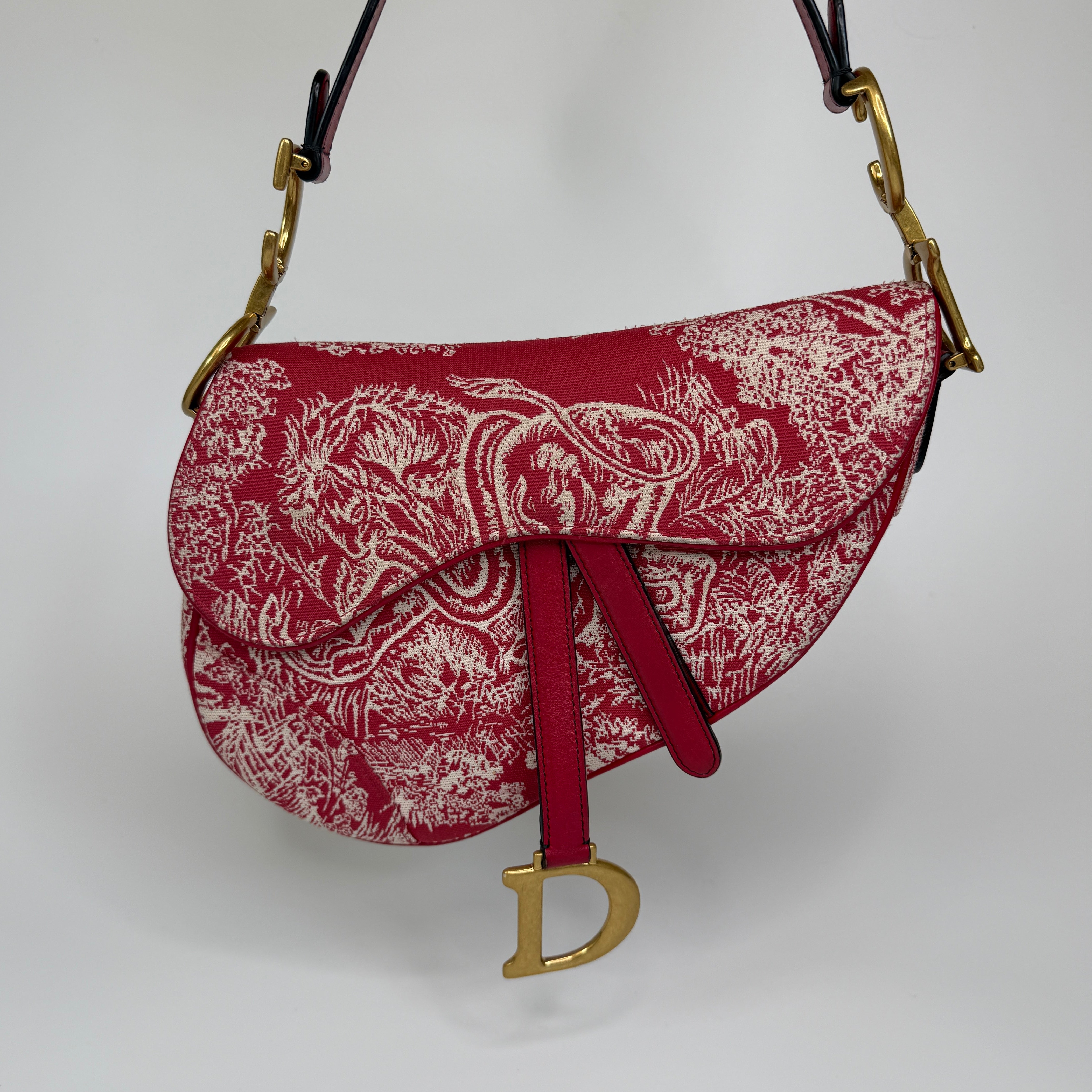 Christian Dior Saddle Bag In Rain Forest Red. Authentic and preloved In excellent condition. 100% Authenticity guarantee 