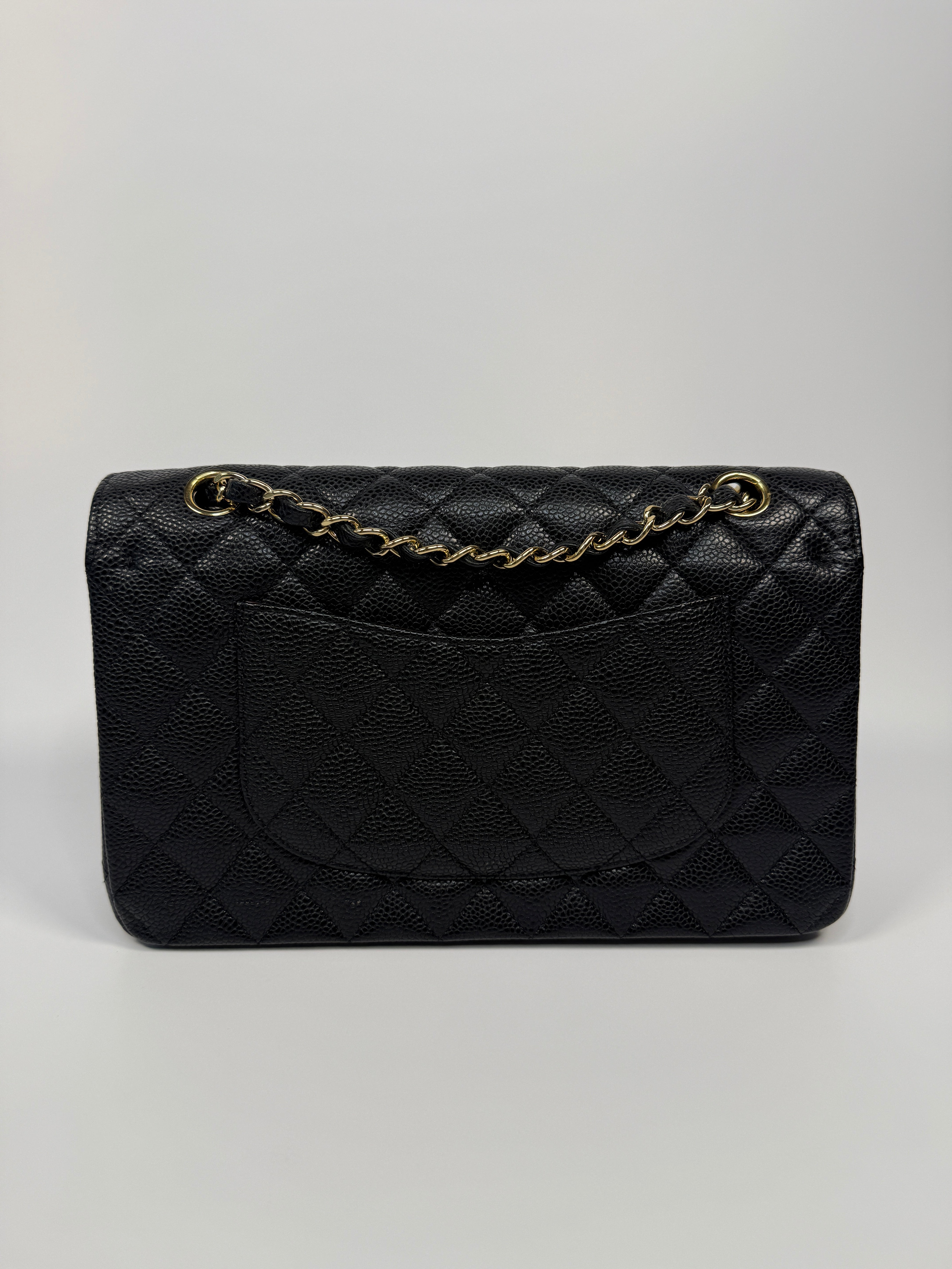 Chanel Medium Classic Double Flap Black CaviarWith Gold Hardware
Pre Loved & Authentic 